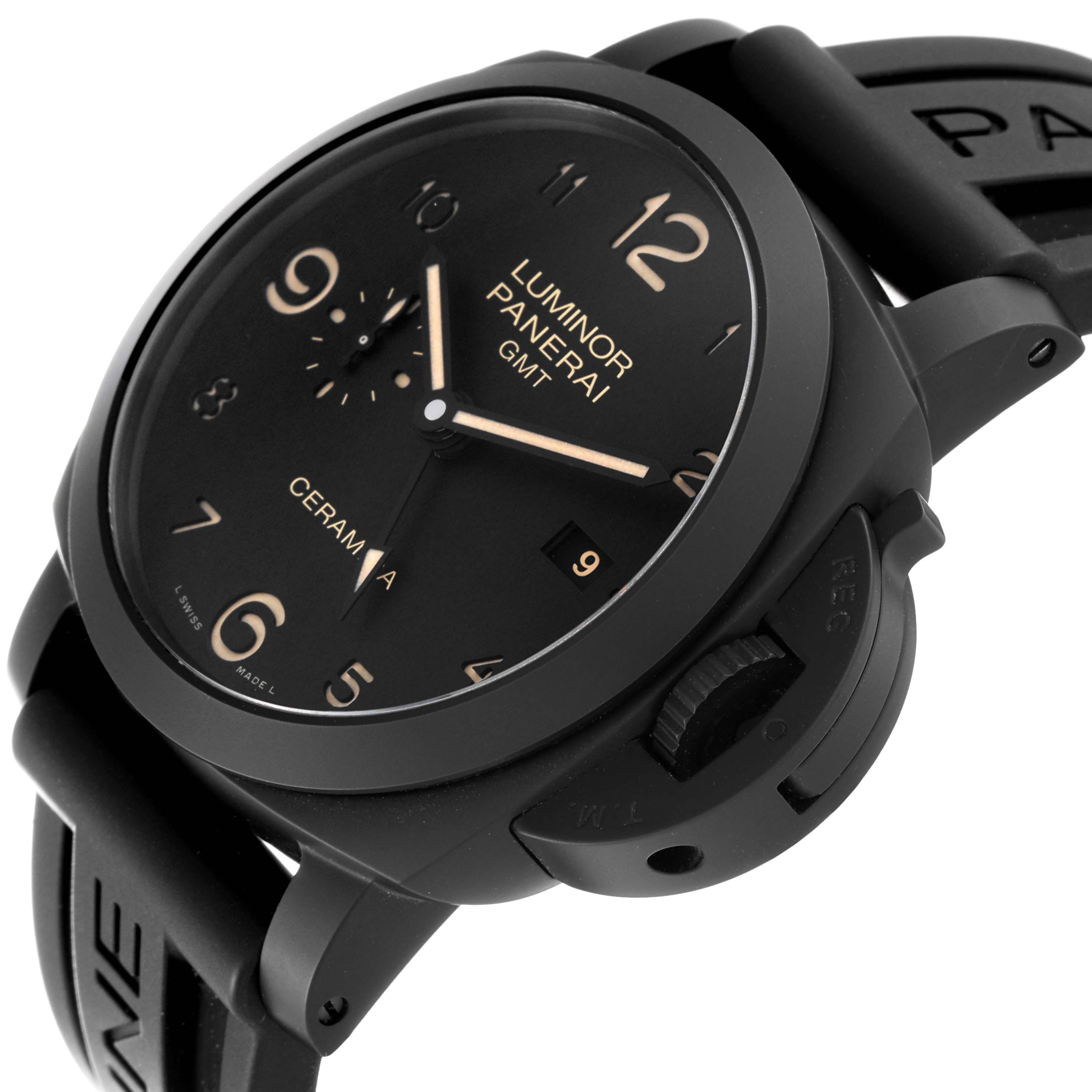 The image shows a side angle of a Luminor Panerai GMT Ceramica watch, highlighting the face, crown guard, and part of the strap.