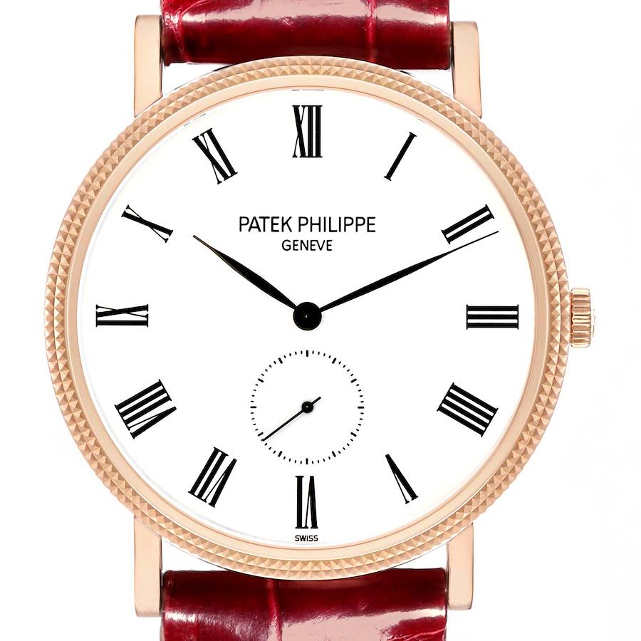 The Patek Philippe Calatrava watch is shown from the front, displaying the dial, hands, crown, and part of the leather strap.