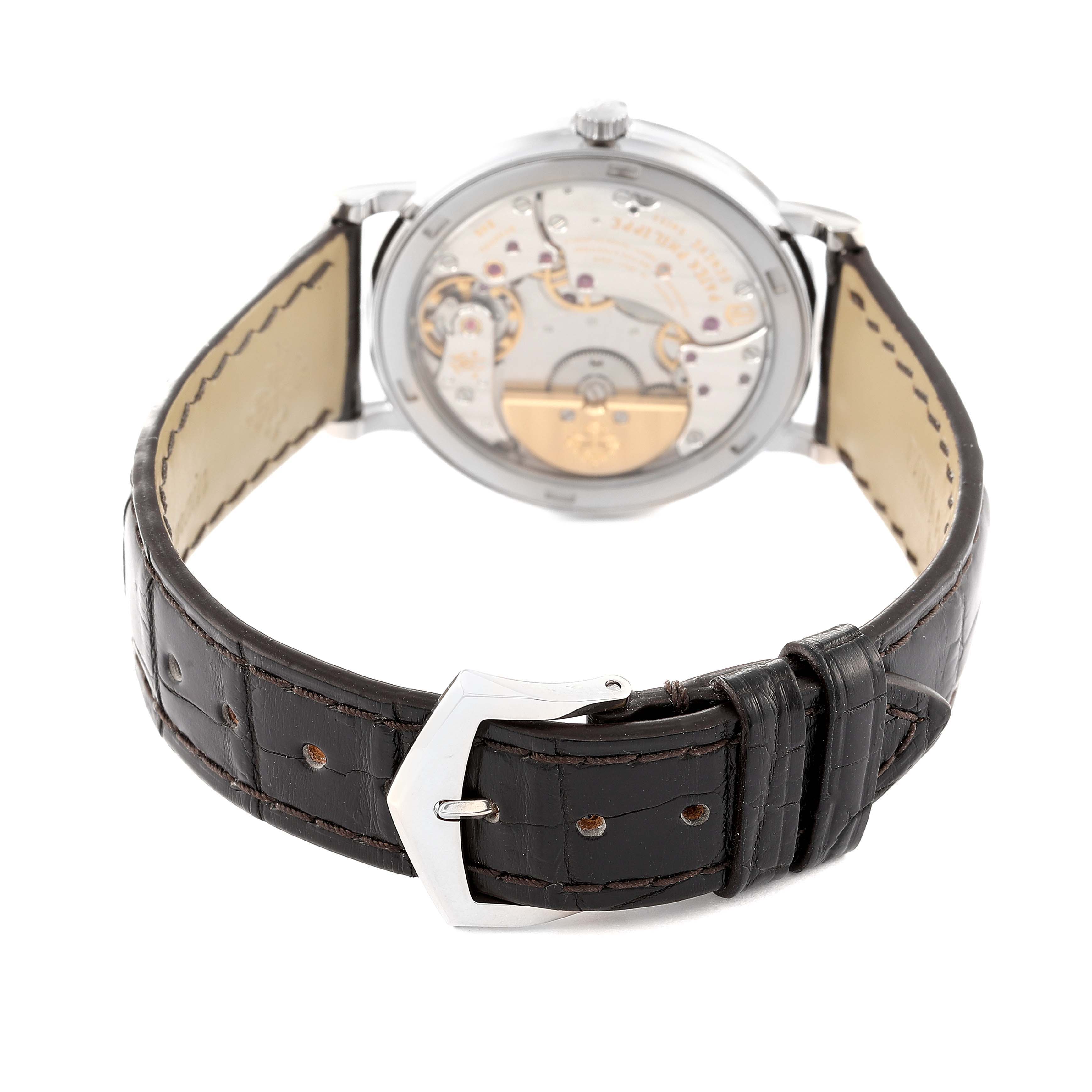 The image shows the back view of the Patek Philippe Calatrava 5120G Men's White Gold White Dial 5120G Men's White Gold White Dial watch, highlighting its movement and strap.