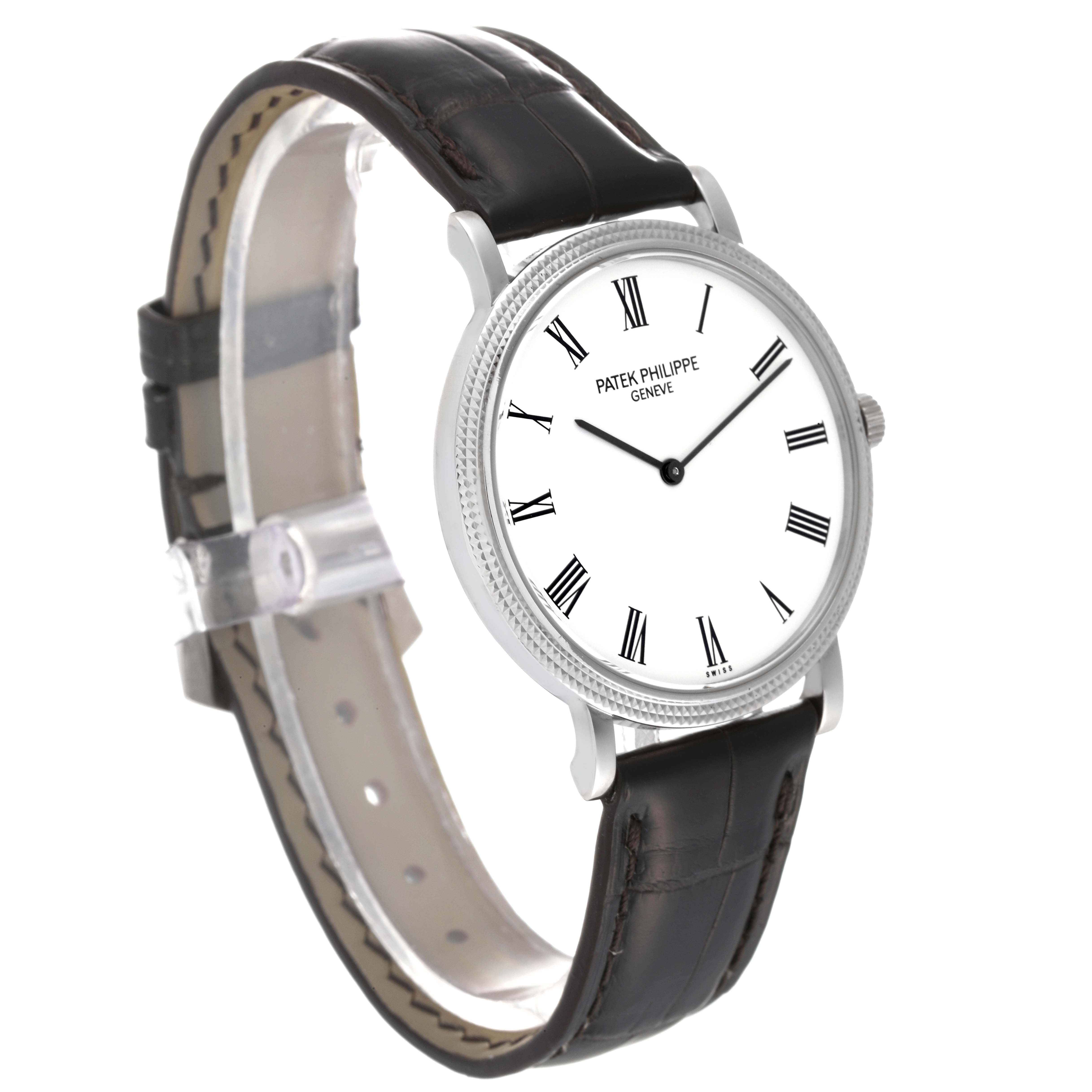 The image shows a Patek Philippe Calatrava 5120G Men's White Gold White Dial 5120G Men's White Gold White Dial watch from a front-side angle, highlighting its dial, case, and leather strap.