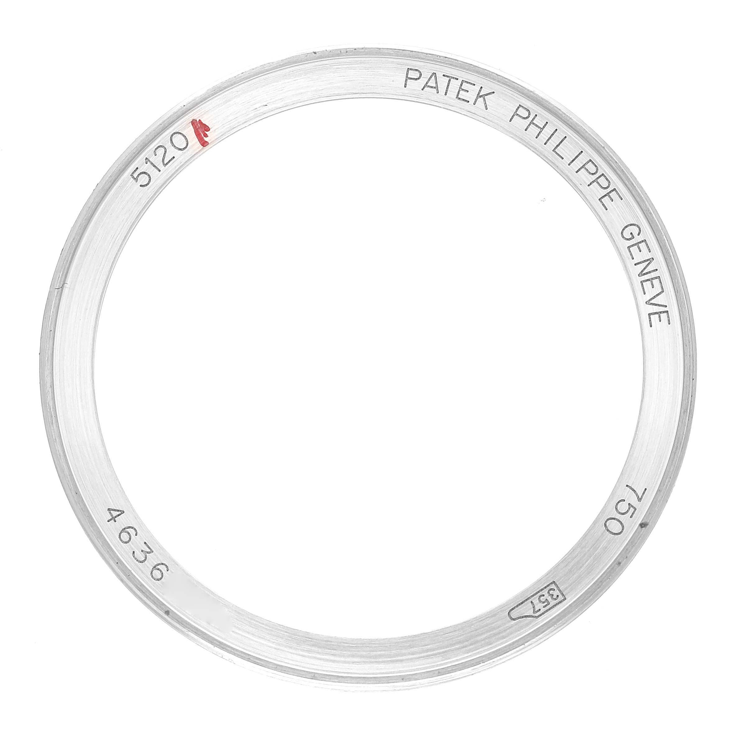 This image shows a close-up of a bezel for the Patek Philippe Calatrava 5120G Men's White Gold White Dial 5120G Men's White Gold White Dial 5120 watch, marked with various engravings.