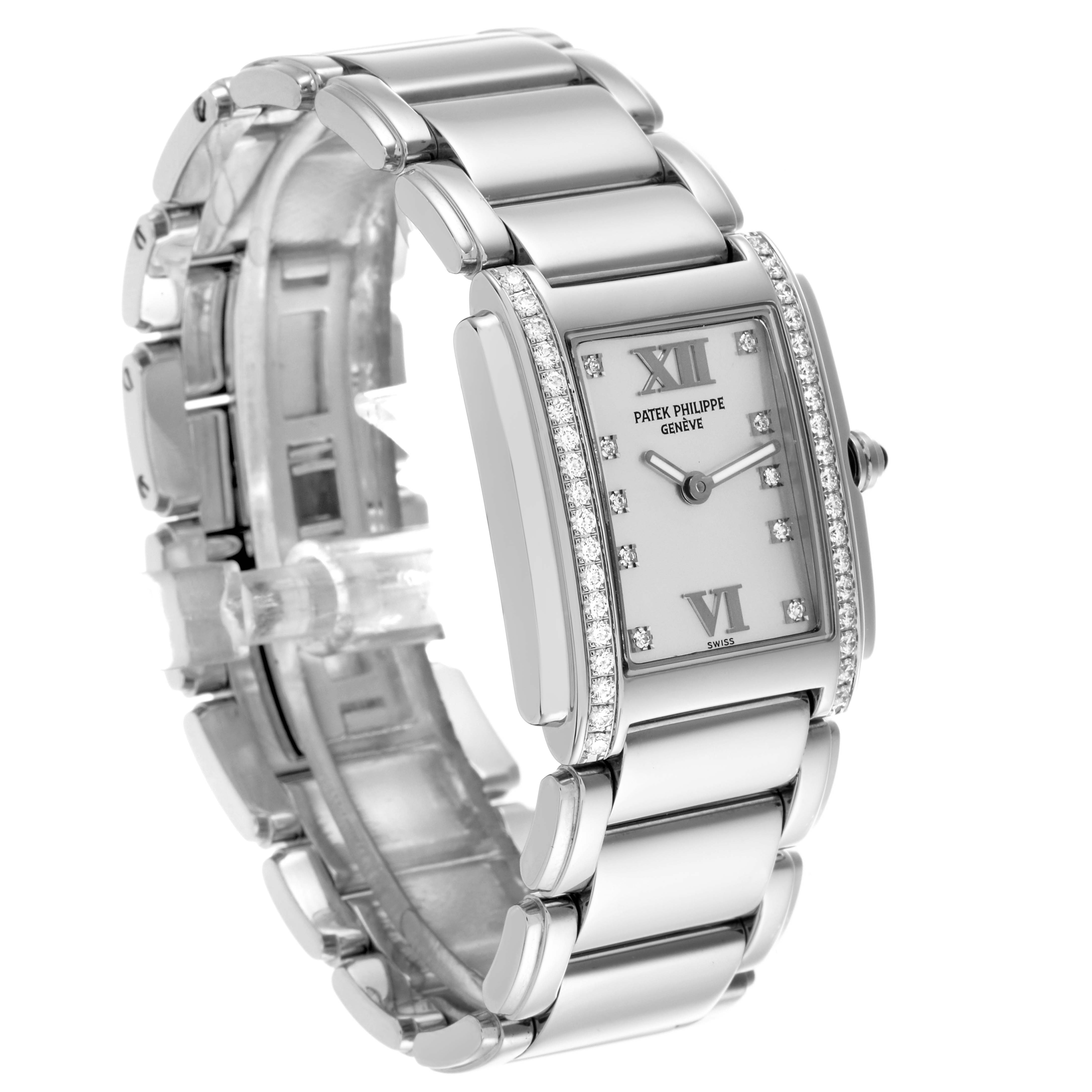 The Patek Philippe Twenty-4 4910/10A-011 Women's Stainless Steel Silver Dial 4910/10A-011 Women's Stainless Steel Silver Dial watch is shown from a three-quarter angle, displaying its bracelet, rectangular case, and diamond-set bezel.