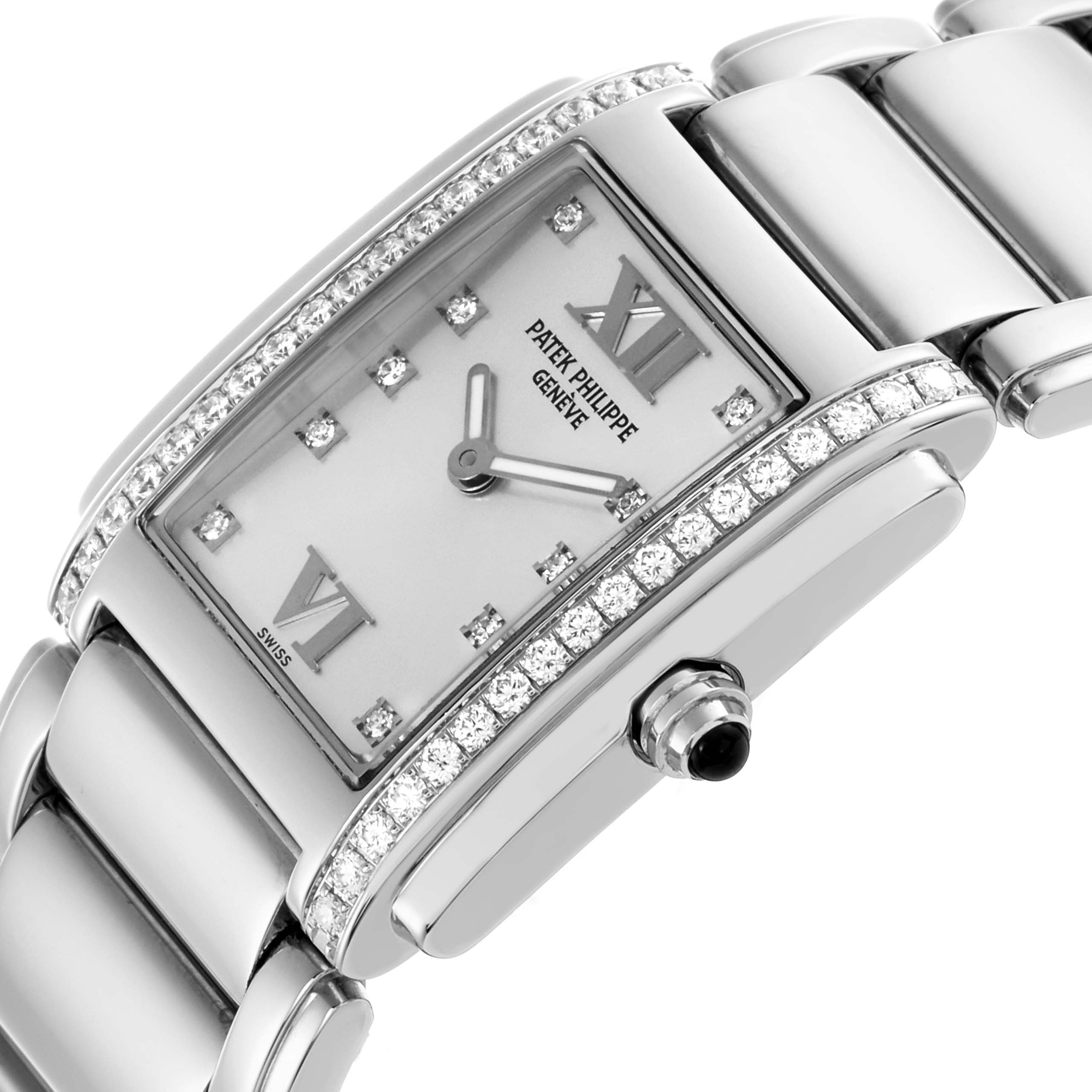 The Patek Philippe Twenty-4 4910/10A-011 Women's Stainless Steel Silver Dial 4910/10A-011 Women's Stainless Steel Silver Dial watch is shown at an angled close-up, highlighting the diamond-studded bezel and links.
