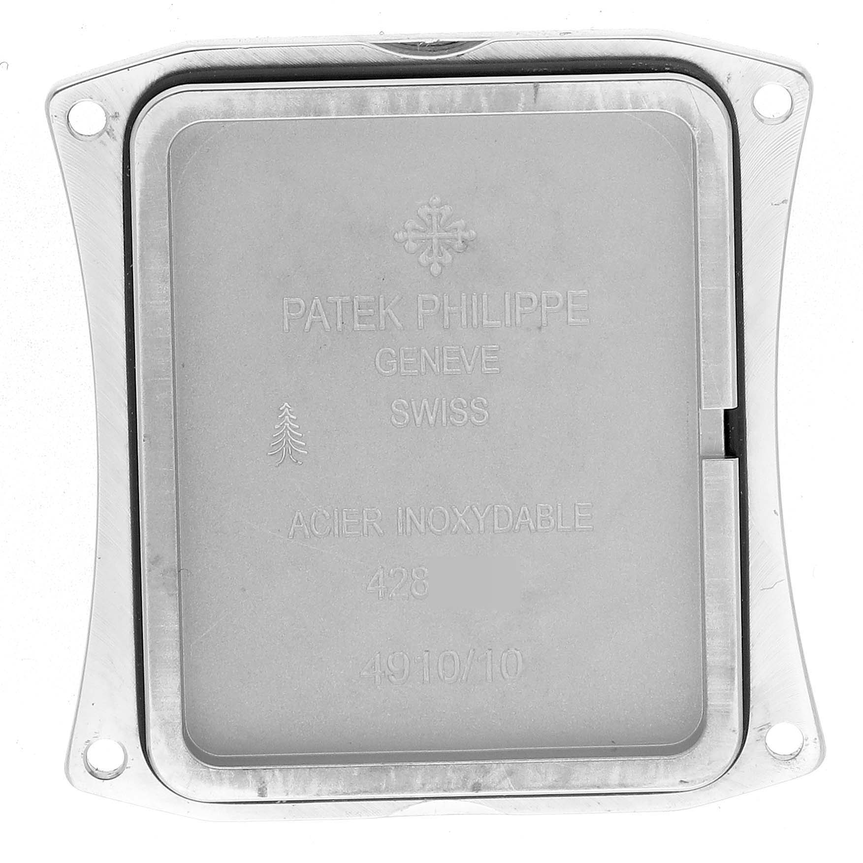 This image shows the back cover of a Patek Philippe Twenty-4 4910/10A-011 Women's Stainless Steel Silver Dial 4910/10A-011 Women's Stainless Steel Silver Dial watch from a top-down angle, highlighting inscriptions and materials.
