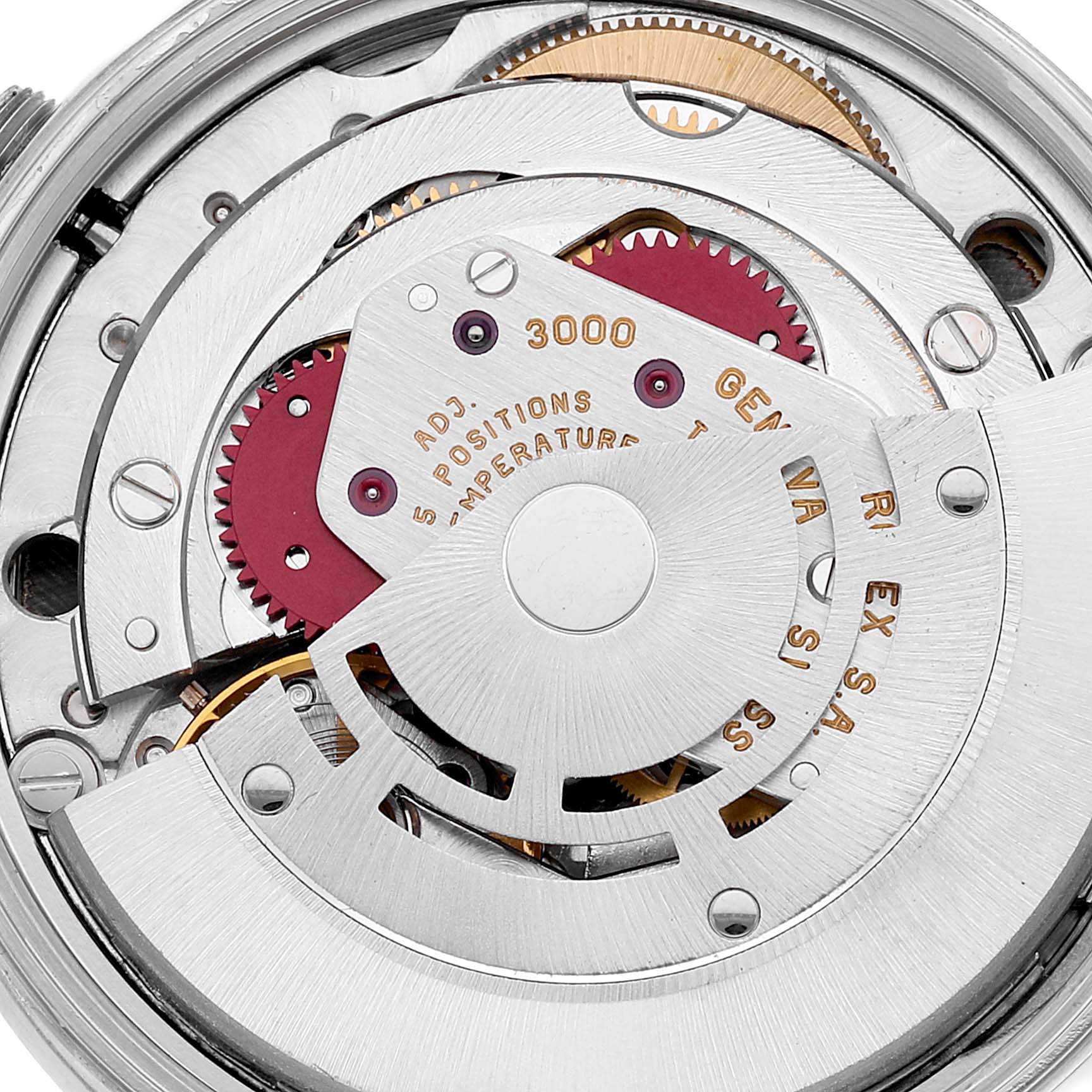 The image shows a close-up of the movement mechanism inside the Rolex Air-King 14010 Men's Stainless Steel Black Dial 14010 Men's Stainless Steel Black Dial watch, highlighting gears and intricate components.