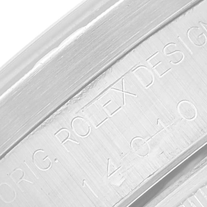 This close-up image shows the engraved inner bezel of a Rolex Air-King 14010 Men's Stainless Steel Black Dial 14010 Men's Stainless Steel Black Dial model watch.