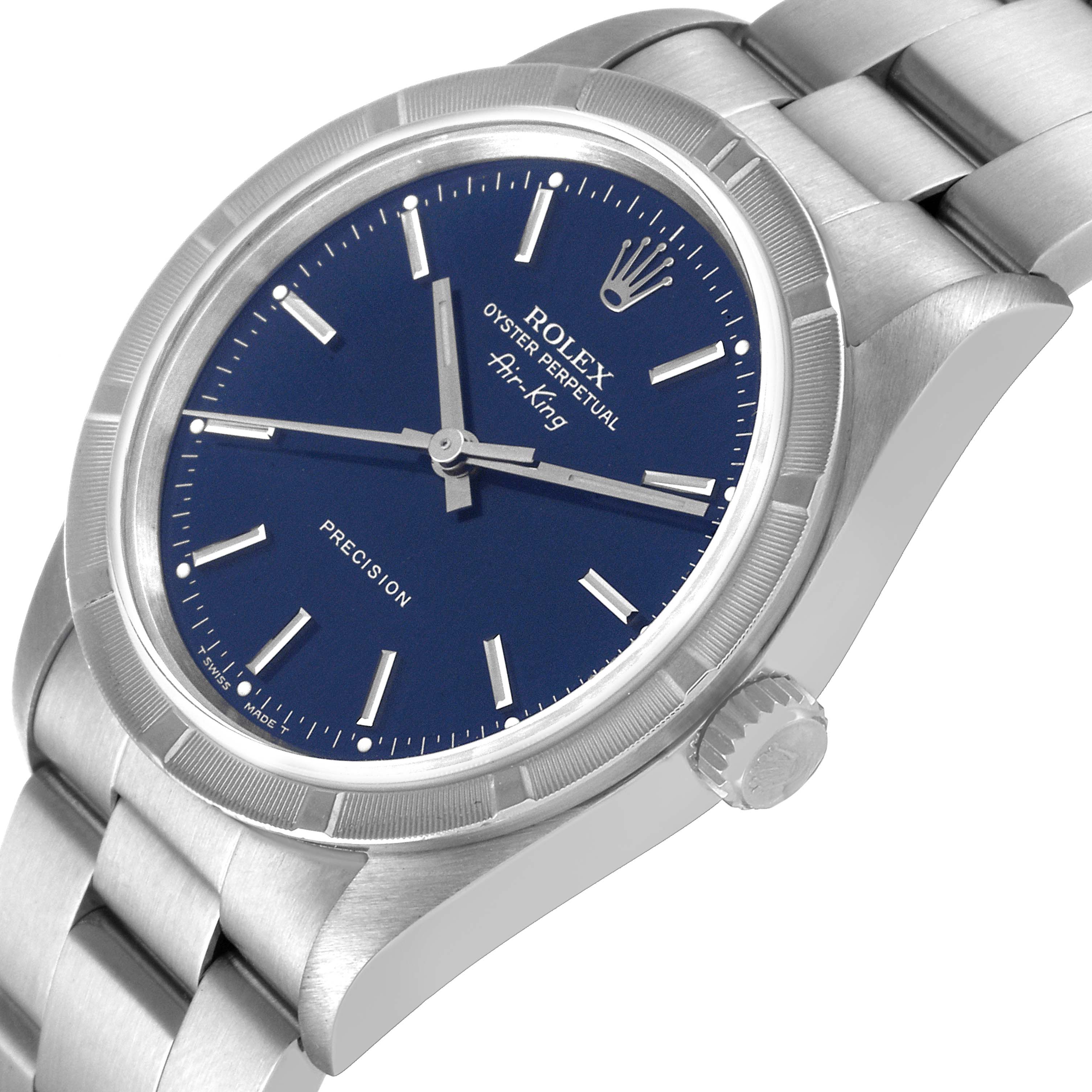The image shows a side angle view of the Rolex Air-King 14010 Men's Stainless Steel Blue Dial 14010 Men's Stainless Steel Blue Dial watch featuring a blue dial, silver markers, and a stainless steel bracelet.