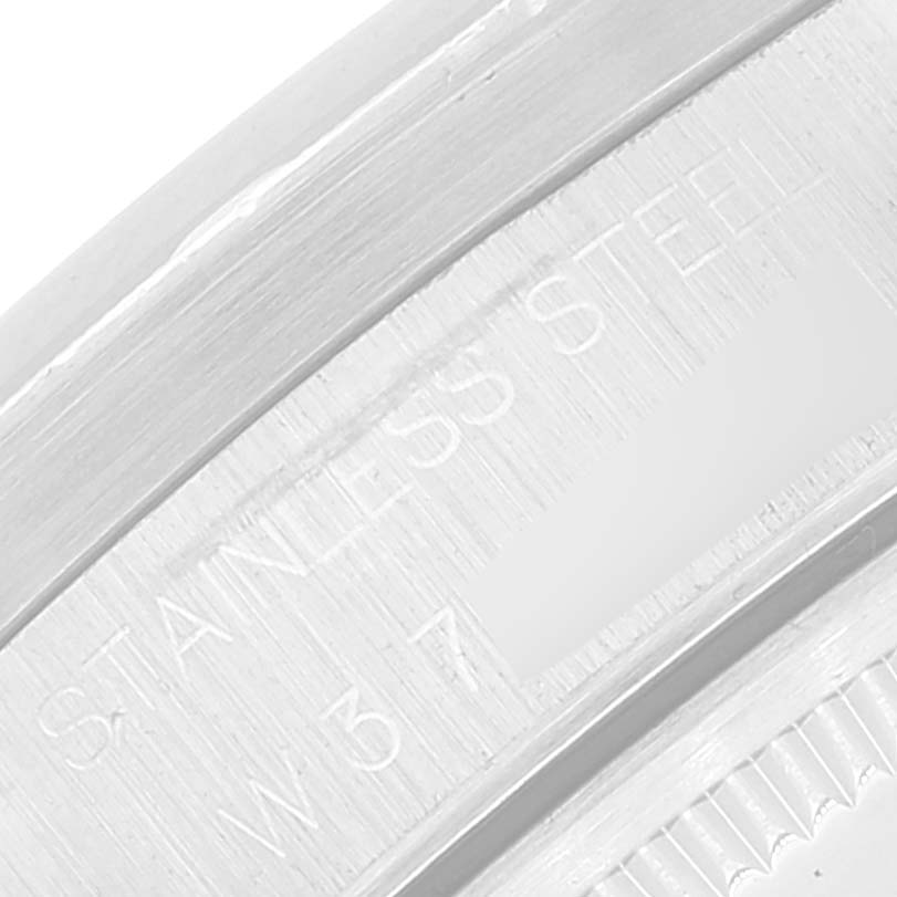 The image shows a close-up of the stainless steel edge and markings on the Rolex Air-King 14010 Men's Stainless Steel Blue Dial 14010 Men's Stainless Steel Blue Dial watch.