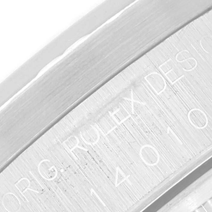 The image shows a close-up of the engraving on a Rolex Air-King 14010 Men's Stainless Steel Blue Dial 14010 Men's Stainless Steel Blue Dial watch bezel.