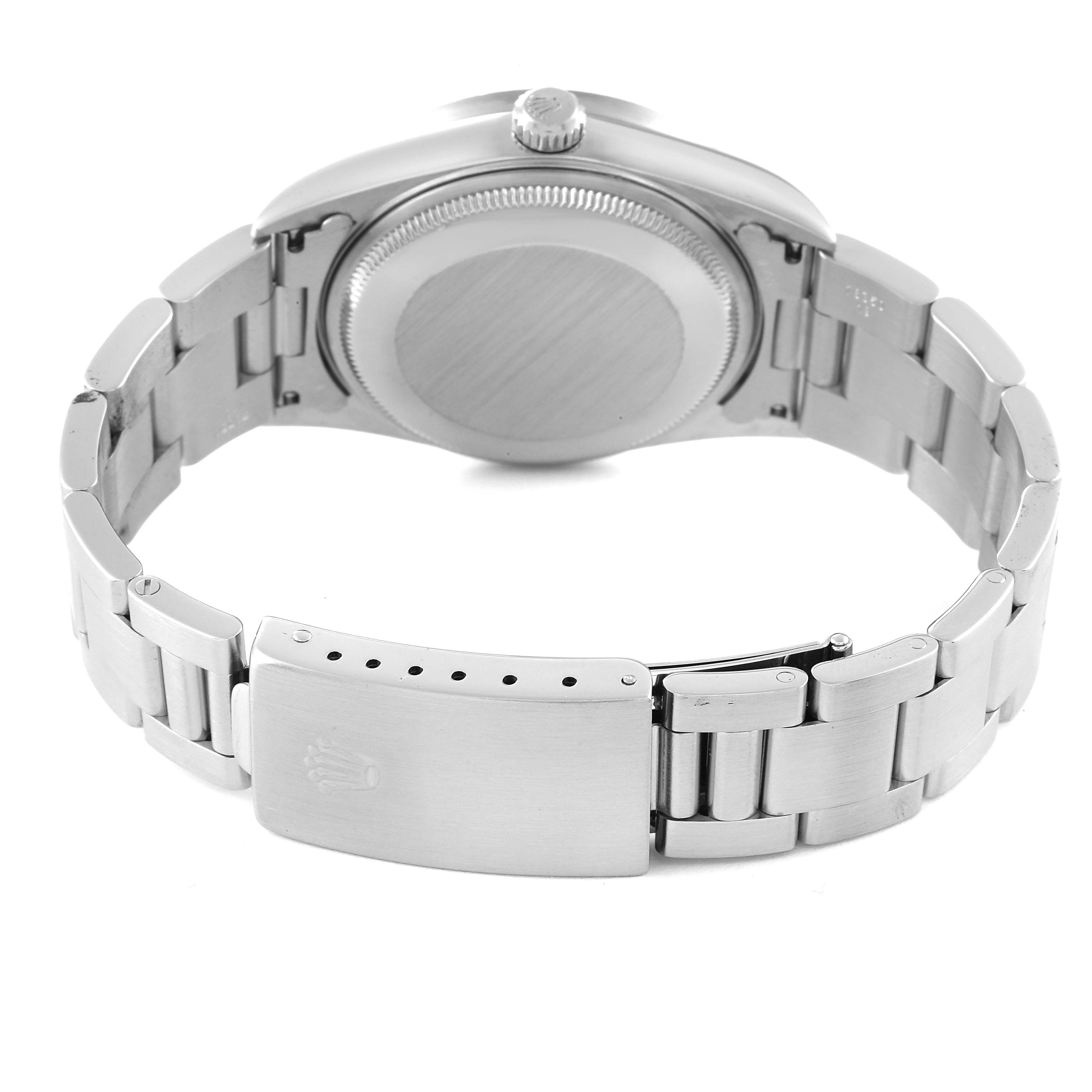 The image shows the back case, crown, and metal bracelet clasp of a Rolex Air-King 14010 Men's Stainless Steel Blue Dial 14010 Men's Stainless Steel Blue Dial watch from the rear angle.