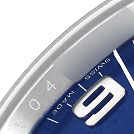 This close-up image of a Rolex Air-King 114234 Men's Stainless Steel Blue Dial 114234 Men's Stainless Steel Blue Dial watch shows the "Swiss Made" text and part of the 9 o'clock marker on the dial.