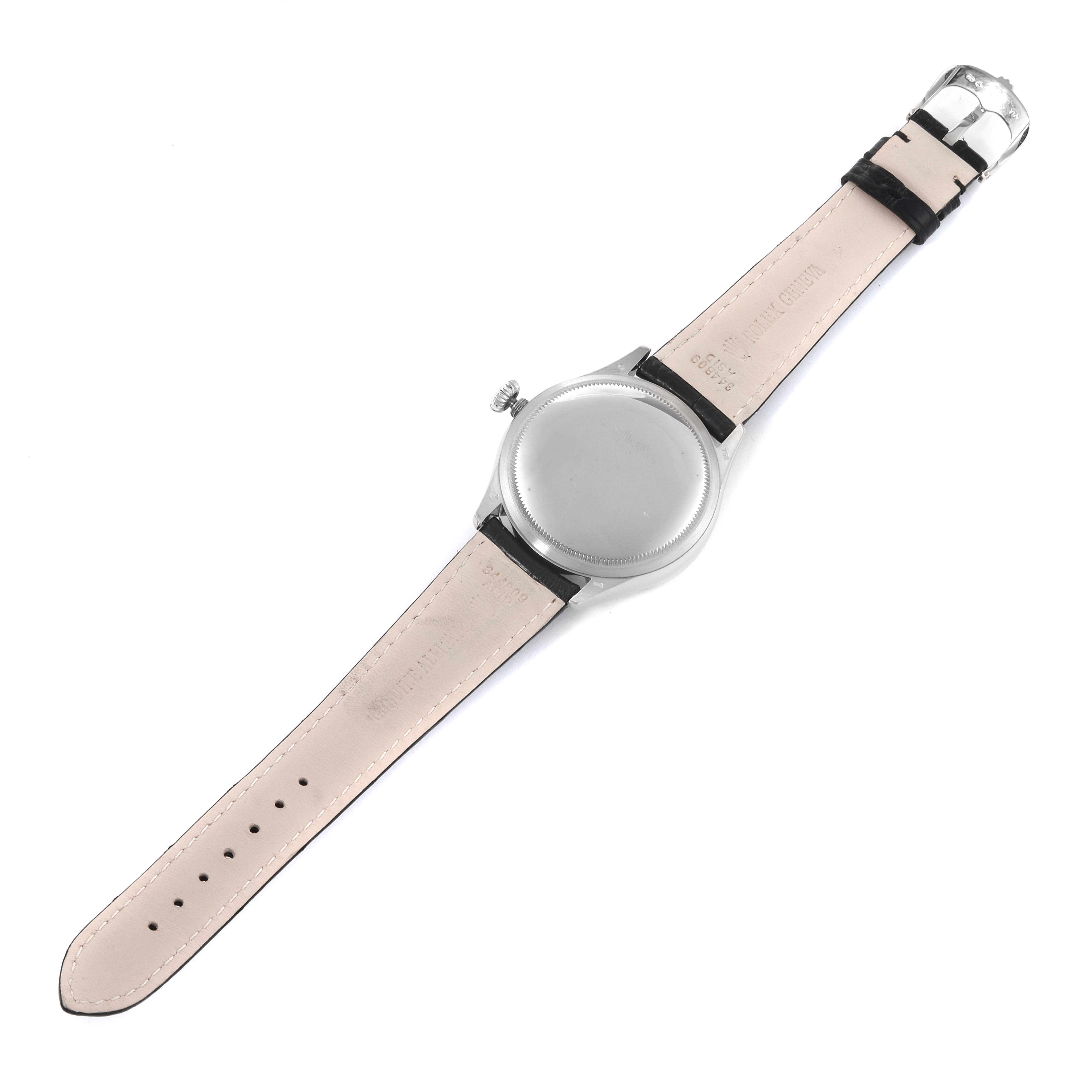 The image shows the back and side view of a Rolex Cellini 50519 Men
s Stainless Steel Silver Dial 50519 Men
s Stainless Steel Silver Dial watch, displaying its strap and buckle.