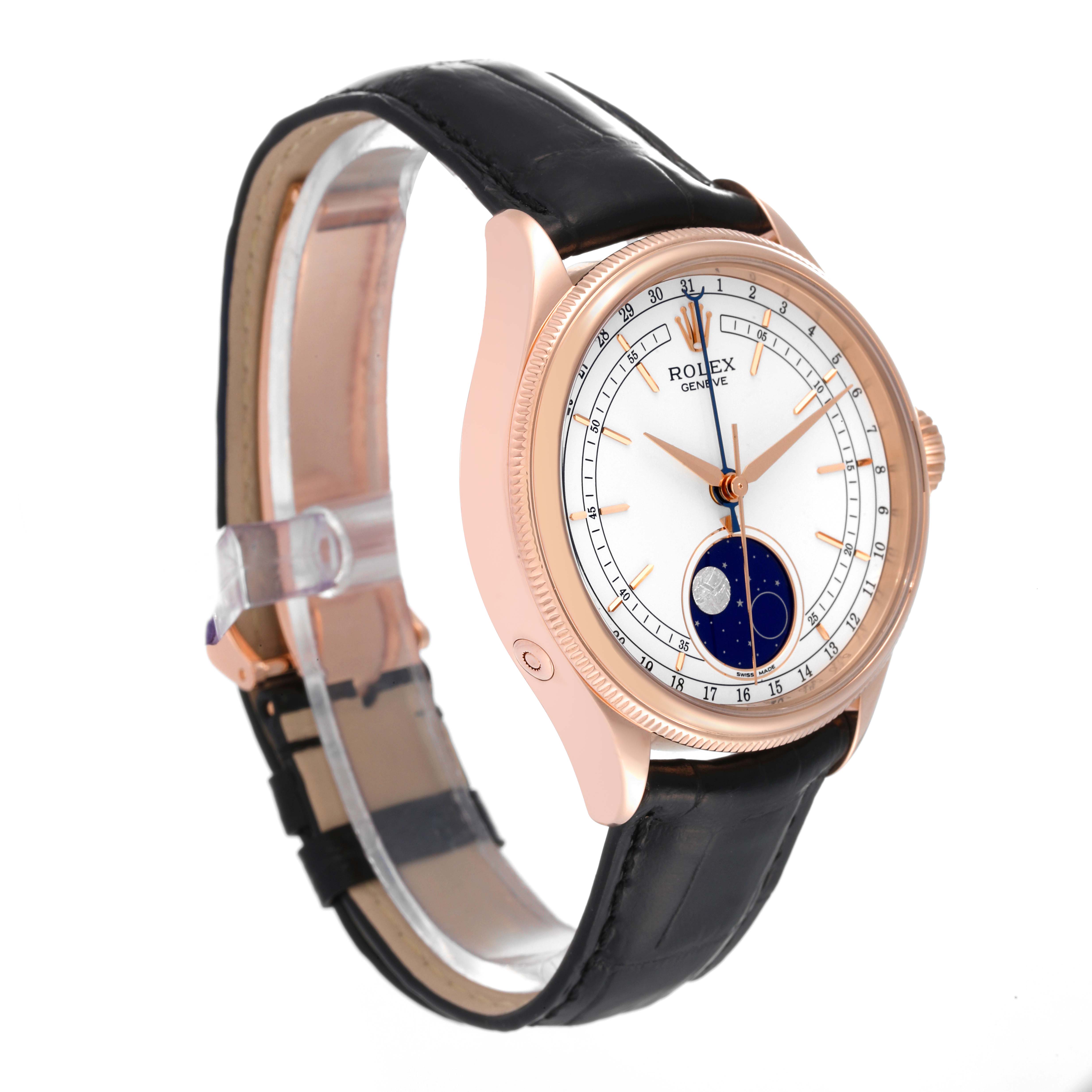 The Rolex Cellini 50535 Men
s Rose Gold White Dial 50535 Men
s Rose Gold White Dial watch is shown at a slight side angle, displaying its black leather strap and detailed white face with a moon phase indicator.