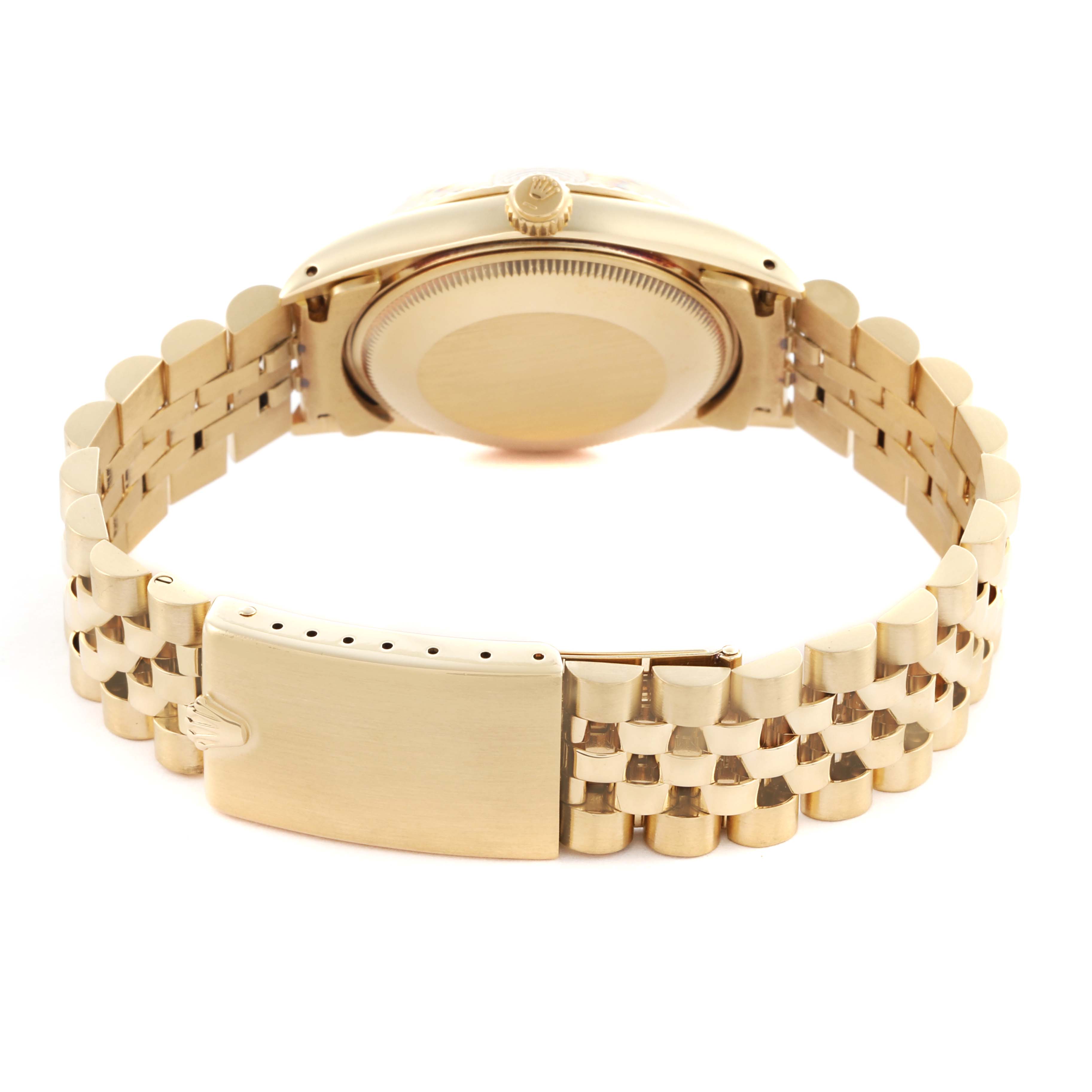 The image shows the back of a Rolex Date watch, highlighting the case back, crown, and bracelet with a visible clasp.