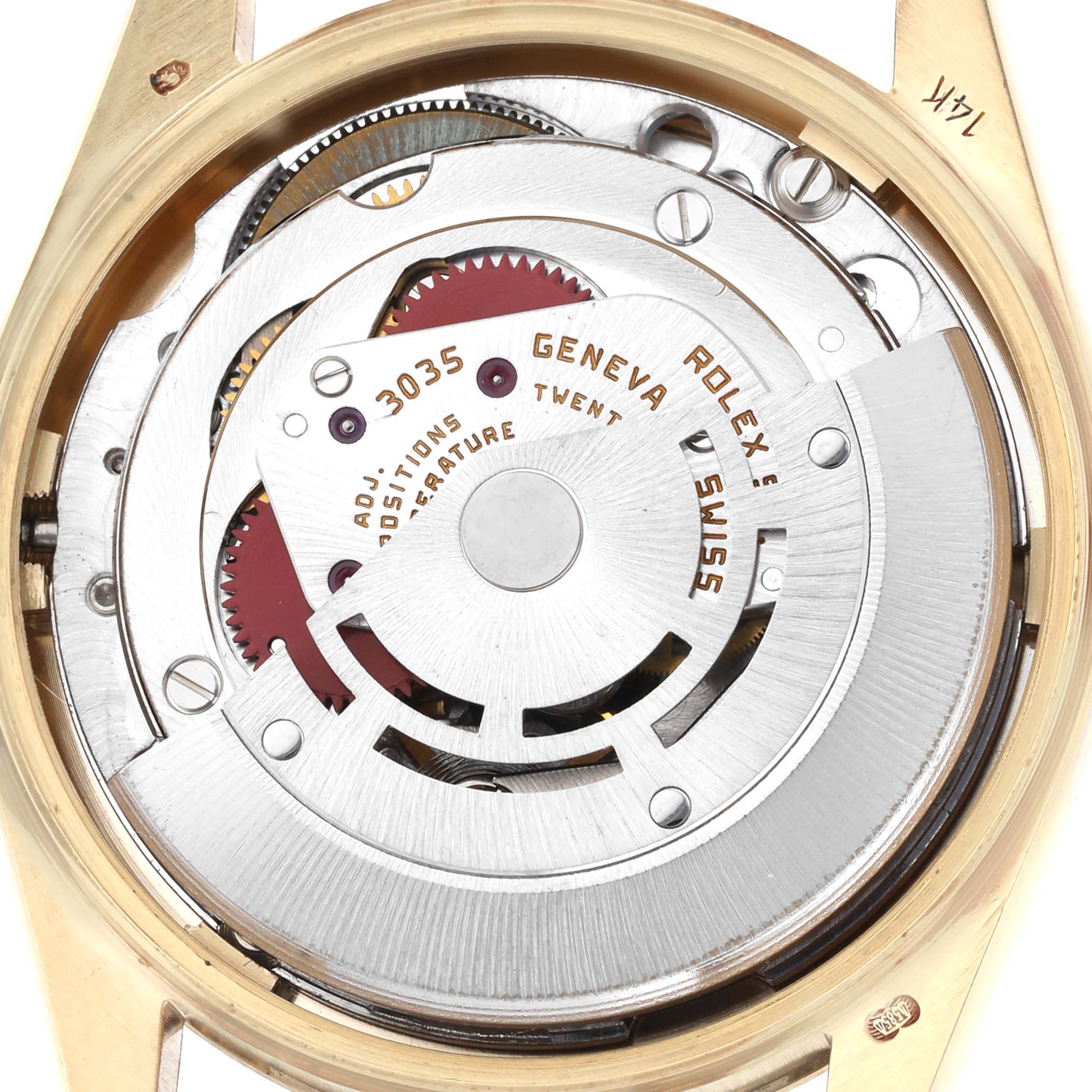 The image shows a Rolex Date model watch from the back, revealing its 3035 movement mechanism.