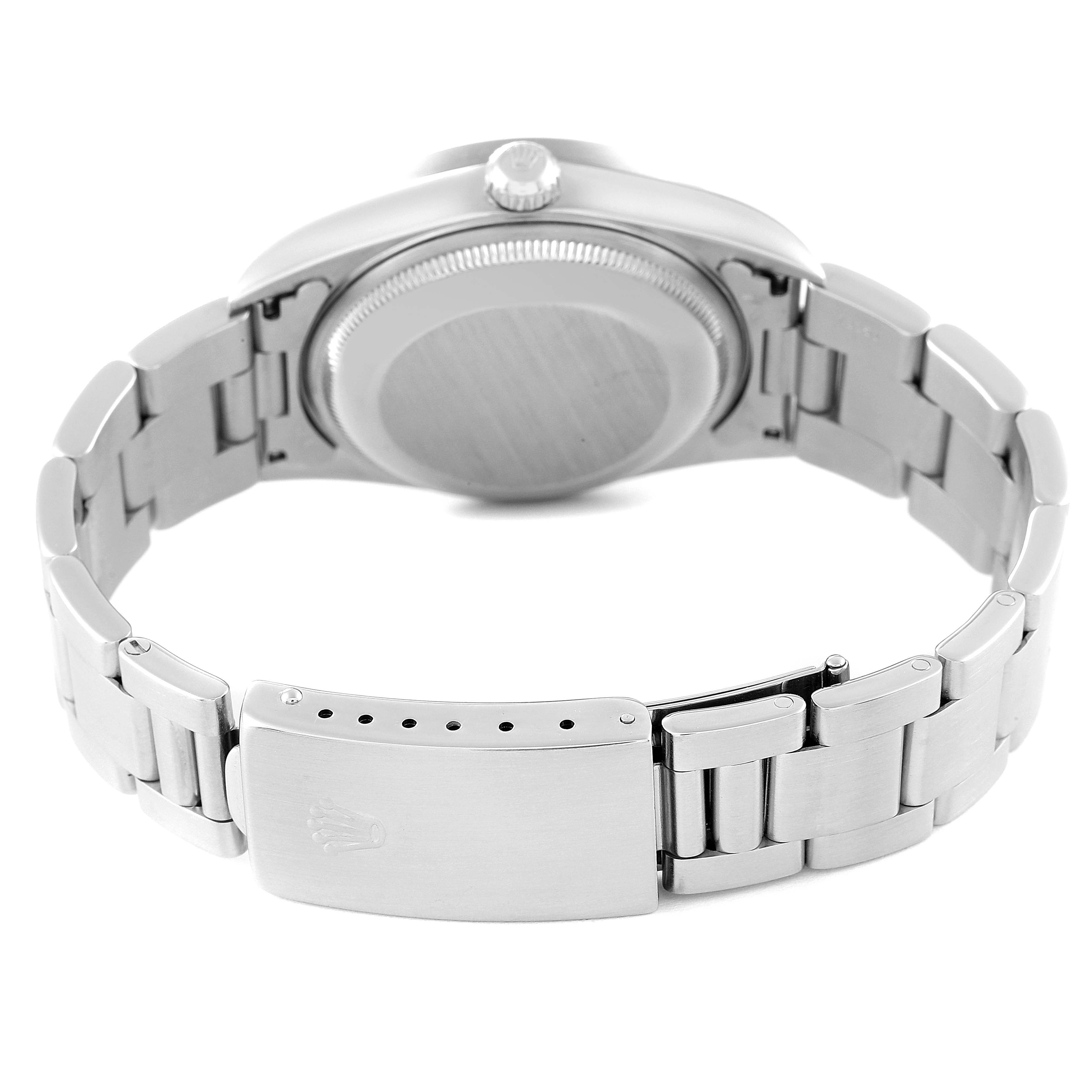 This image shows the back case, crown, and bracelet clasp of a Rolex Date 15210 Men
s Stainless Steel Blue Dial 15210 Men
s Stainless Steel Blue Dial model watch from a rear angle.