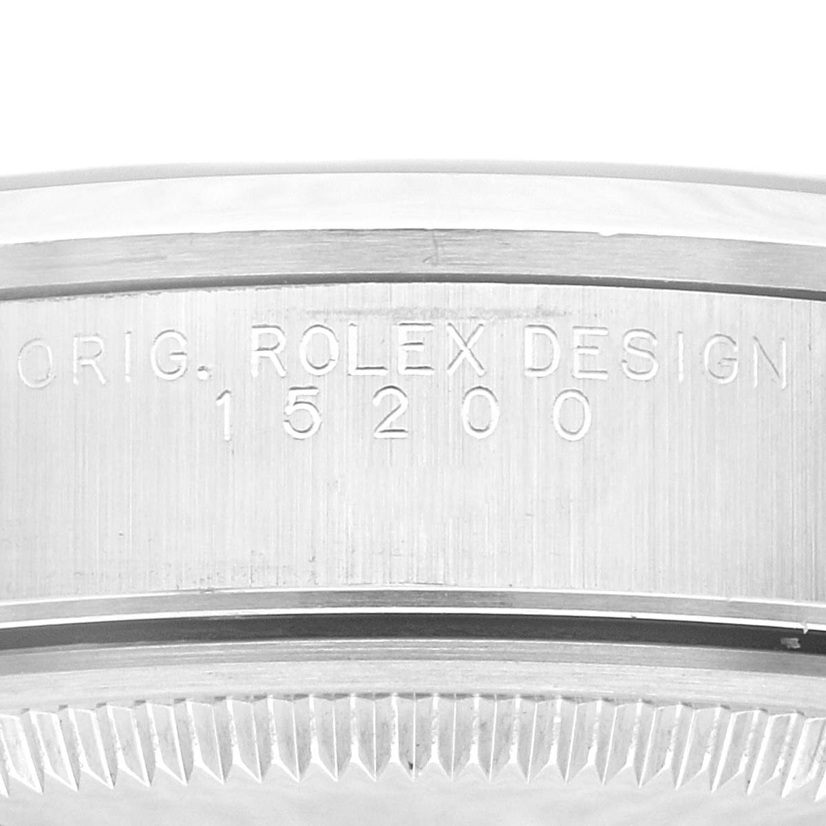 This image shows a close-up of the case side of a Rolex Date 15200 Men's Stainless Steel Blue Dial 15200 Men's Stainless Steel Blue Dial model, showcasing the engraved design and reference number 15200.