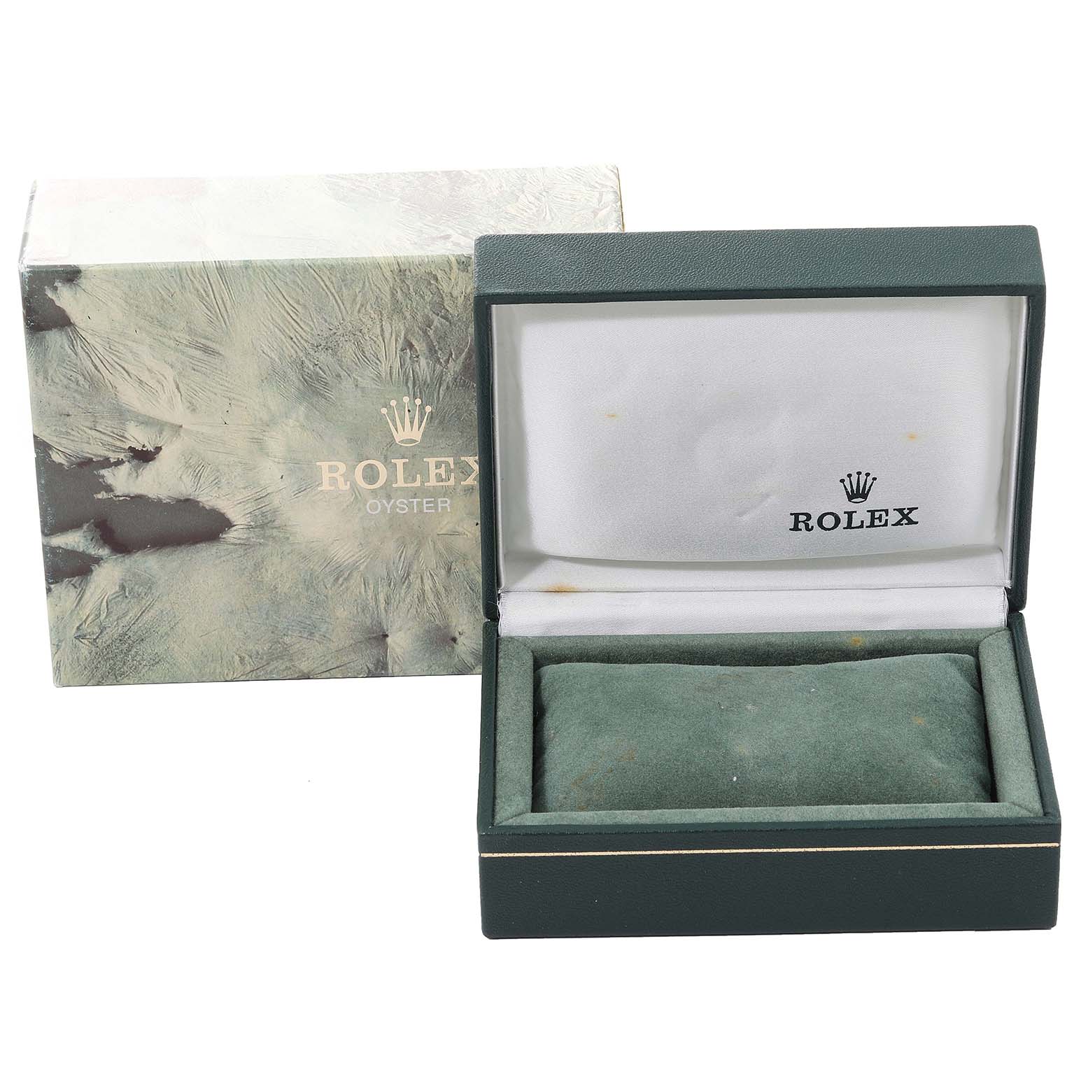 The image shows an open Rolex Oyster Date watch box with its outer packaging beside it.
