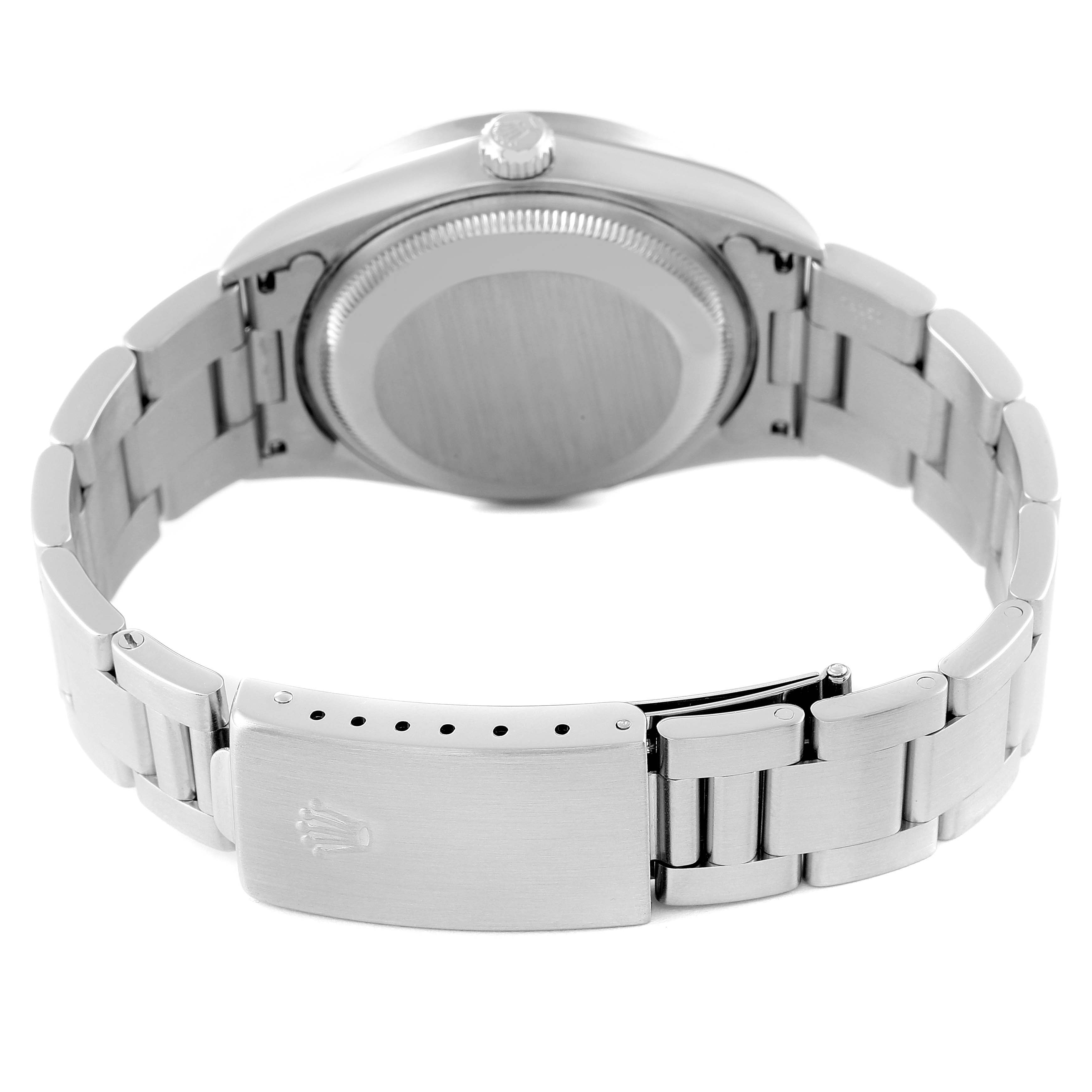 The image shows the back view of a Rolex Date 15210 Men's Stainless Steel Pink Dial 15210 Men's Stainless Steel Pink Dial model, including the case back, crown, and Oyster bracelet with the clasp visible.