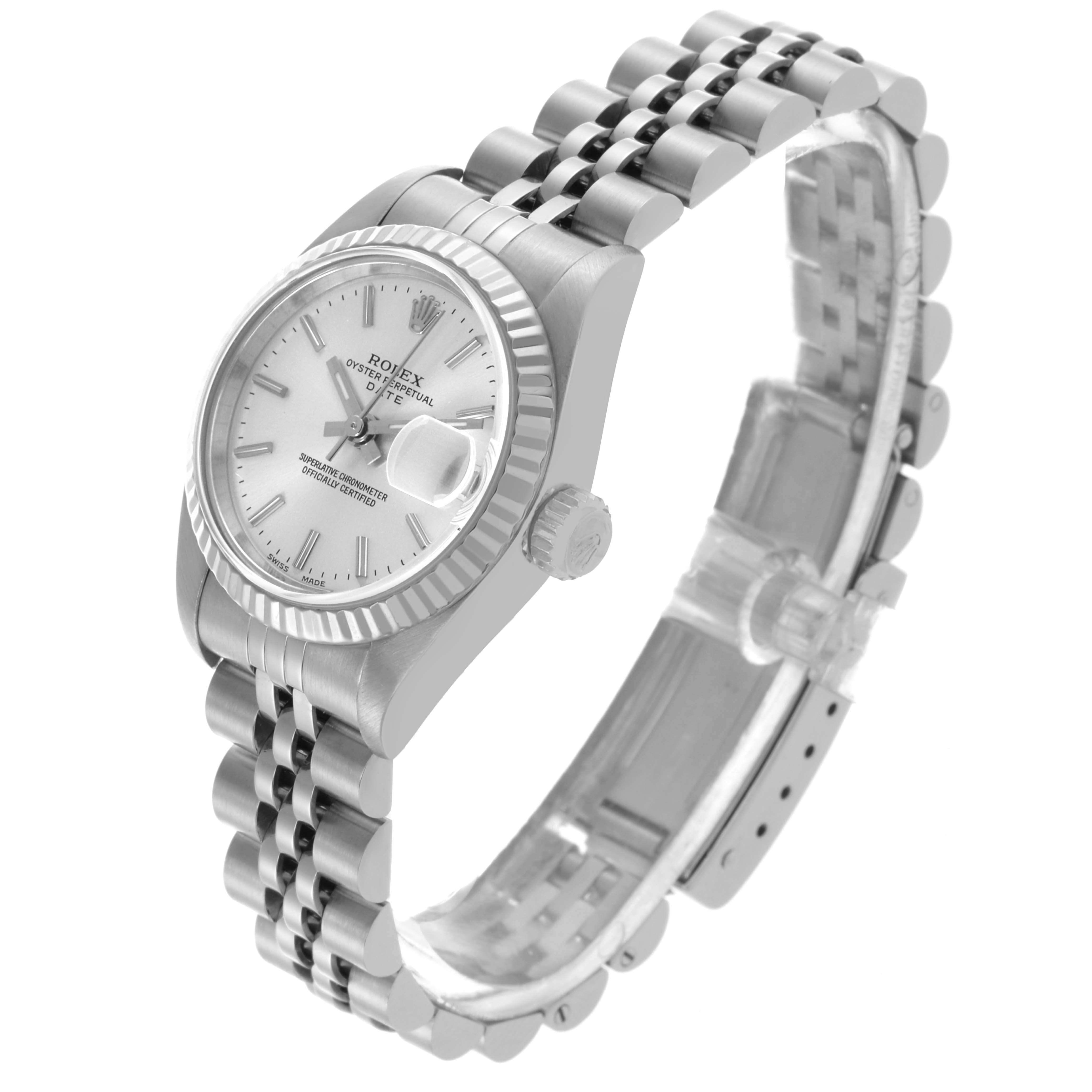 The Rolex Datejust 79174 Women's Stainless Steel Silver Dial 79174 Women's Stainless Steel Silver Dial watch is shown at an angle highlighting the face, fluted bezel, and jubilee bracelet.
