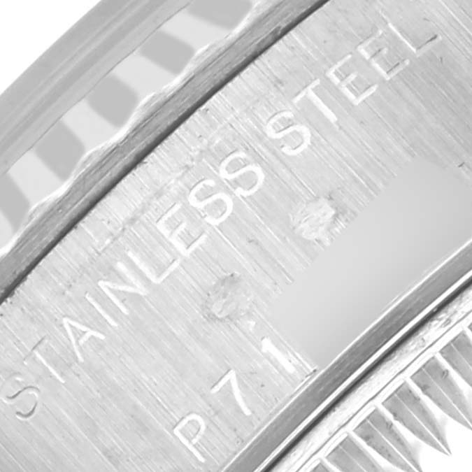 The image shows a close-up of the stainless steel bezel and etching on the side of a Rolex Datejust 79174 Women's Stainless Steel Silver Dial 79174 Women's Stainless Steel Silver Dial watch.