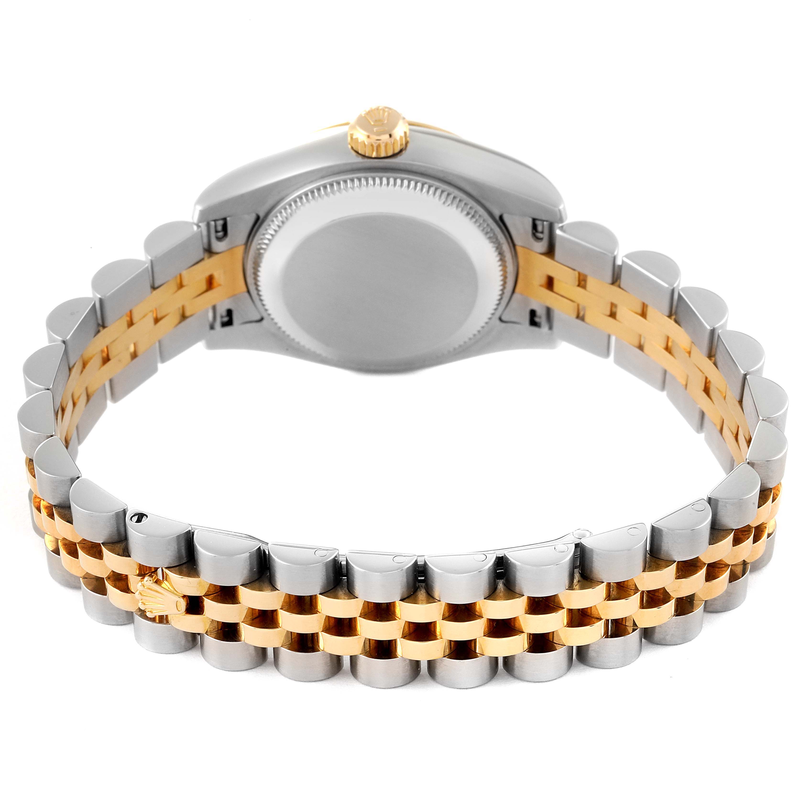 The image shows the back view of the Rolex Datejust 179173 Women's Steel and Gold (two tone) Champagne Dial 179173 Women's Steel and Gold (two tone) Champagne Dial watch, focusing on the case back and the jubilee bracelet.