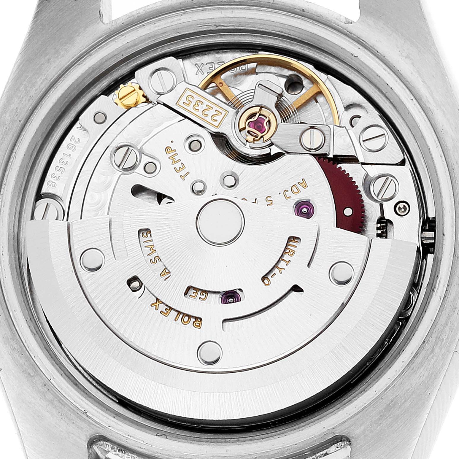 Close-up of the Rolex Datejust 179173 Women's Steel and Gold (two tone) Champagne Dial 179173 Women's Steel and Gold (two tone) Champagne Dial watch movement parts, showing the intricate components of the mechanism.