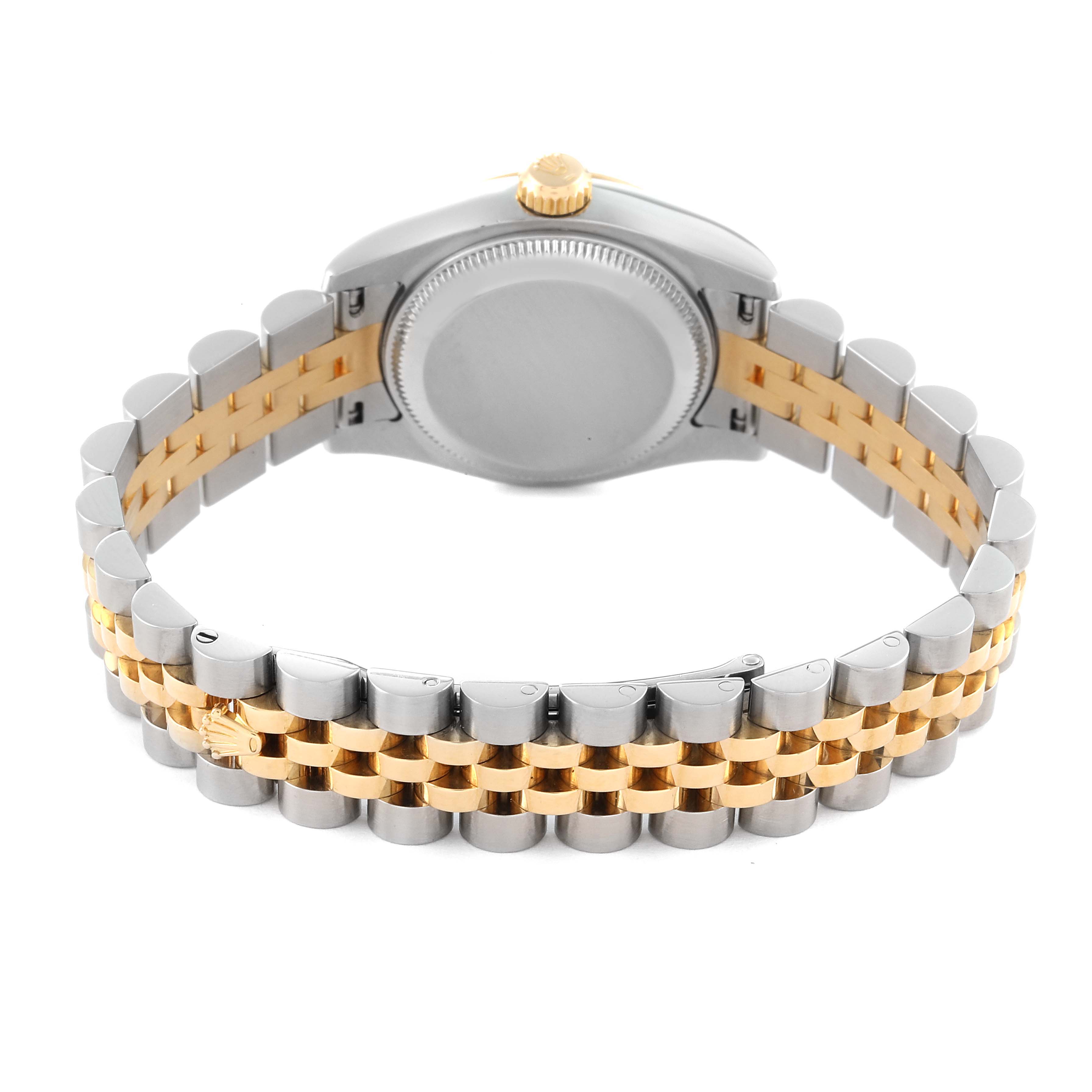 The image shows the back view of a Rolex Datejust 179173 Women's Steel and Gold (two tone) Champagne Dial 179173 Women's Steel and Gold (two tone) Champagne Dial watch, highlighting its case and two-tone bracelet.