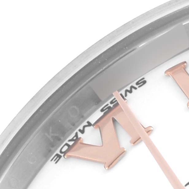 The image shows a close-up of the Rolex Mid-Size 178241 Women's Steel and Gold (two tone) White Dial 178241 Women's Steel and Gold (two tone) White Dial watch face, focusing on the Roman numeral VI, hands, and part of the bezel.