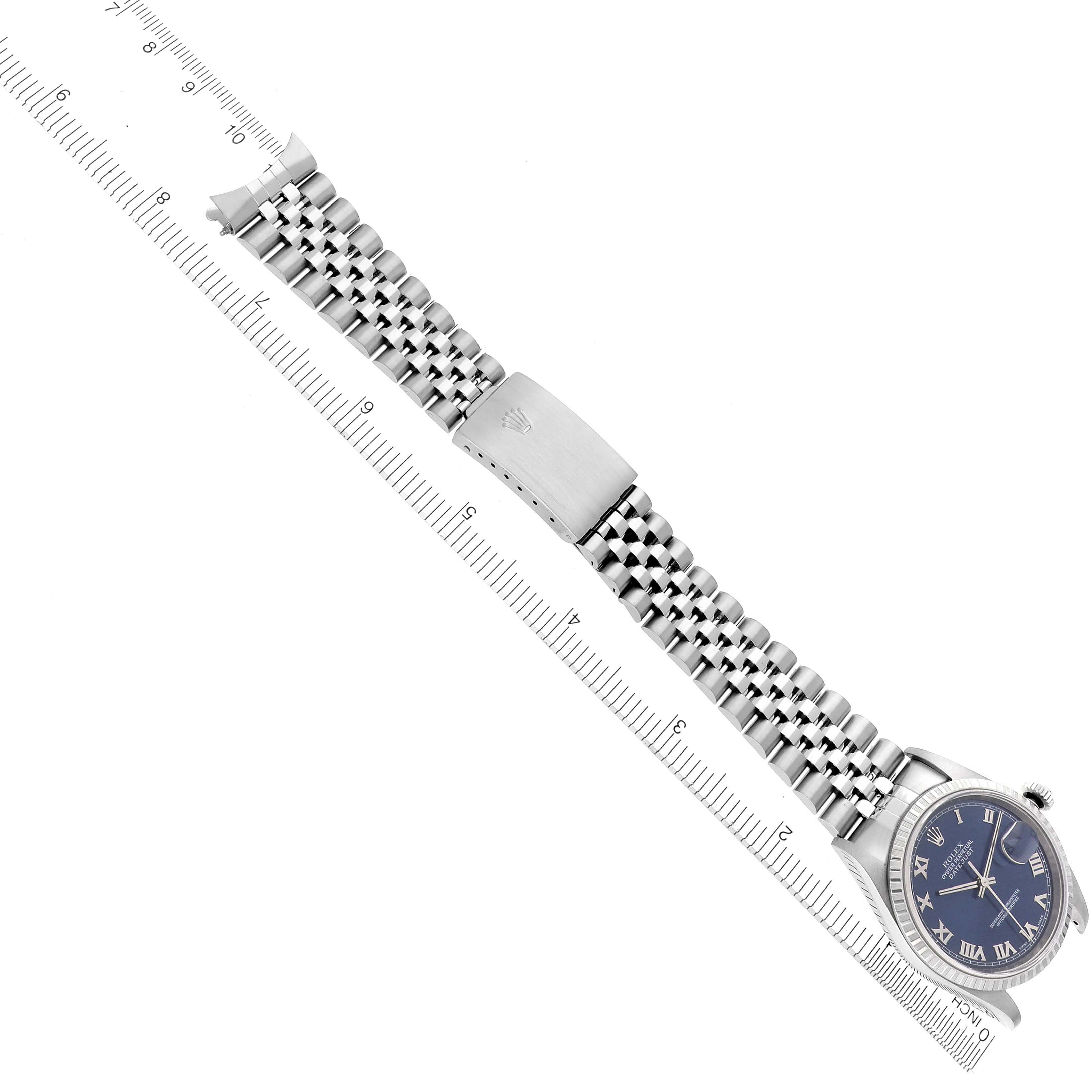 The Rolex Datejust 16220 Men's Stainless Steel Blue Dial 16220 Men's Stainless Steel Blue Dial is shown from a top view, displaying the bracelet, clasp, and blue dial with Roman numerals.