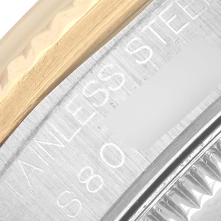 The image shows a close-up of the bezel and case side, highlighting the stainless steel and gold parts of the Rolex Mid-Size 68273 Women's Steel and Gold (two tone) White Dial 68273 Women's Steel and Gold (two tone) White Dial watch.