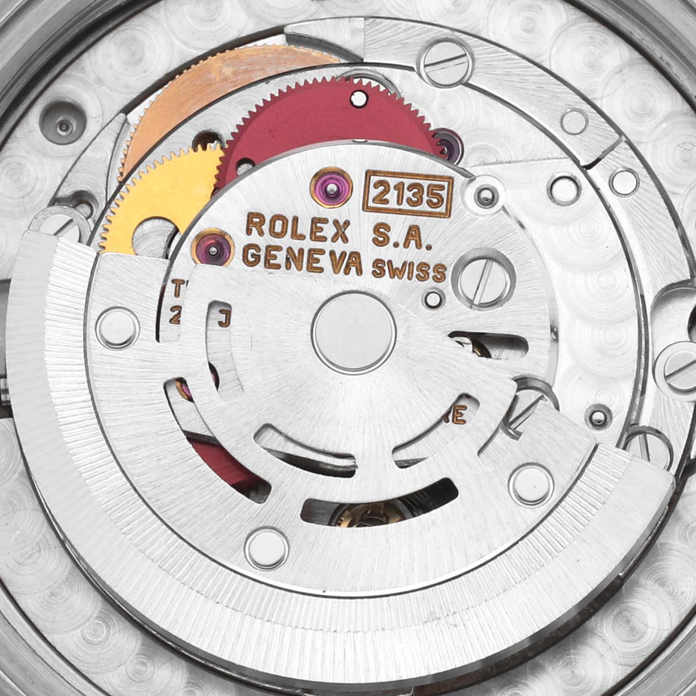 The image shows an up-close view of the Rolex Mid-Size 68273 Women's Steel and Gold (two tone) White Dial 68273 Women's Steel and Gold (two tone) White Dial watch's mechanical movement components.