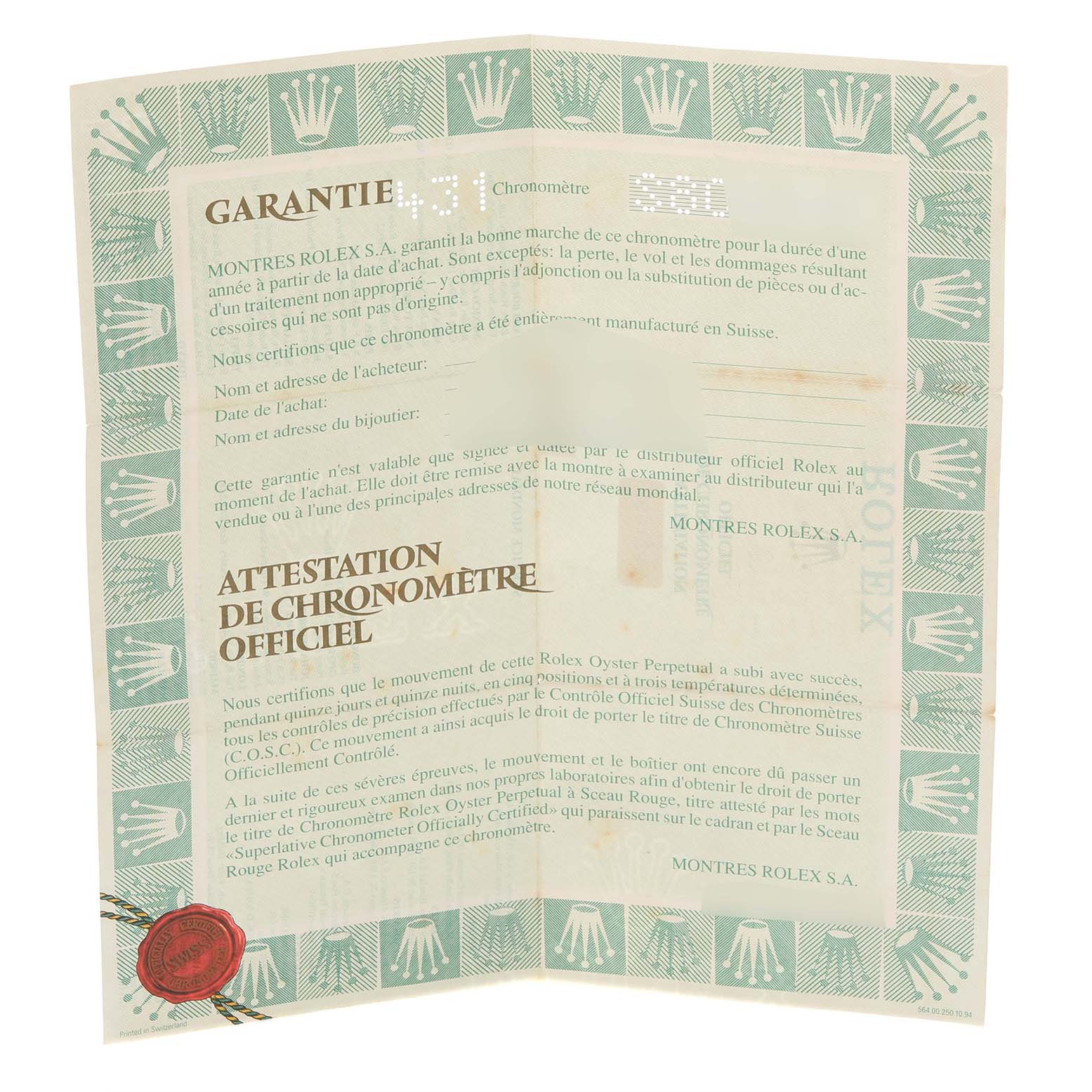 The image shows an unfolded Rolex Datejust 69173 Women's Steel and Gold (two tone) Red Dial 69173 Women's Steel and Gold (two tone) Red Dial warranty card and chronometer certificate from a top-down angle.