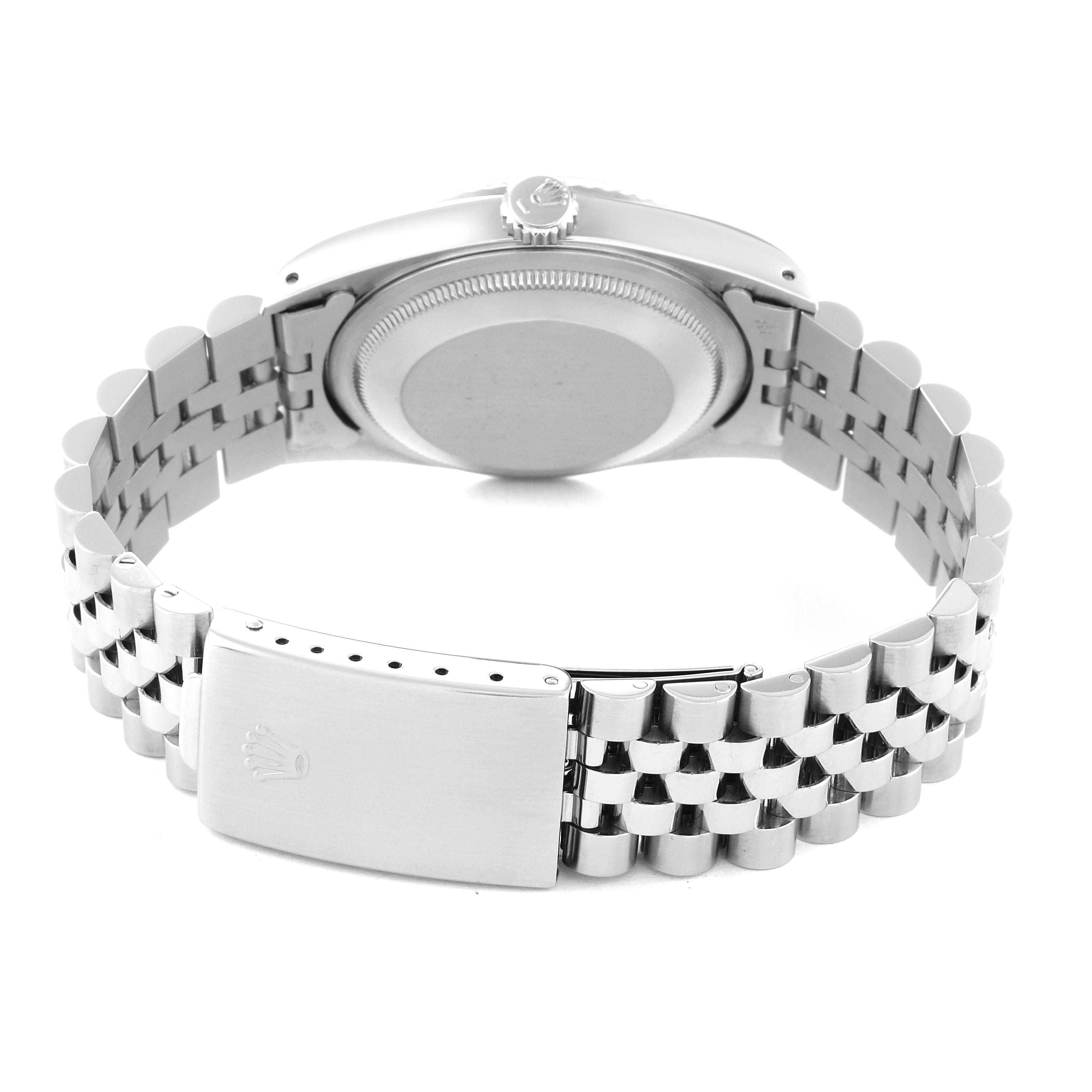 The image shows the back of a Rolex Datejust 16234 Men's Stainless Steel Silver Dial 16234 Men's Stainless Steel Silver Dial watch, focusing on the case back and metal bracelet with the clasp partially open.