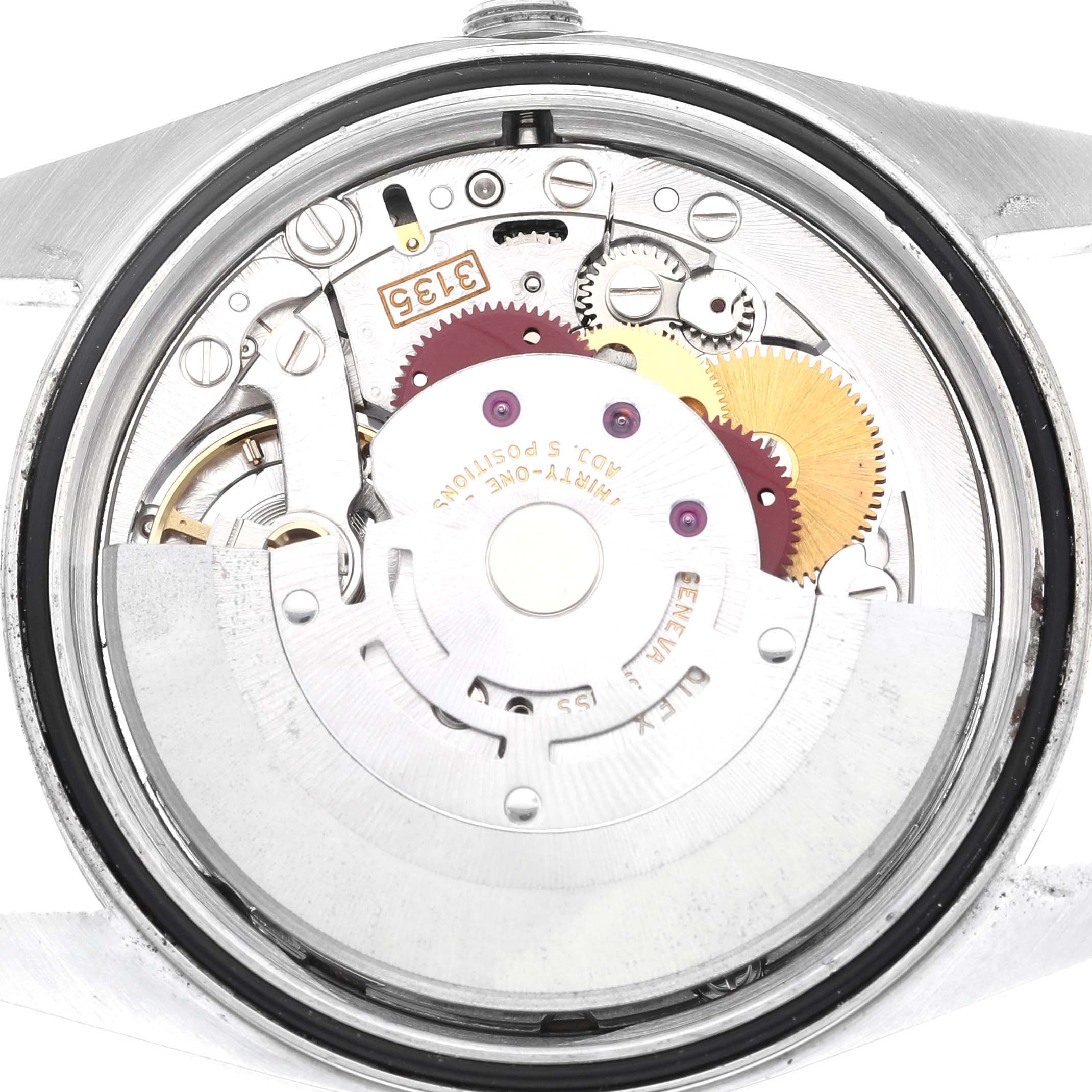 The image shows a detailed view of the movement mechanism inside a Rolex Datejust 16234 Men's Stainless Steel Silver Dial 16234 Men's Stainless Steel Silver Dial watch from the back.