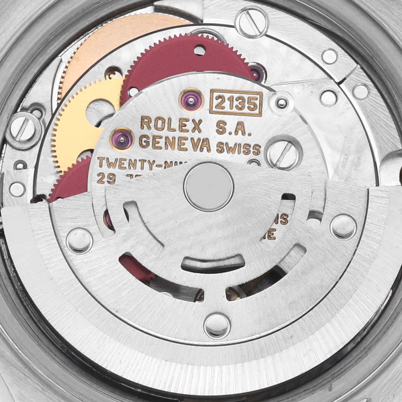 The image shows the movement mechanism of a Rolex Datejust 69174 Women's Stainless Steel Blue Dial 69174 Women's Stainless Steel Blue Dial watch, highlighting gears and inscriptions.