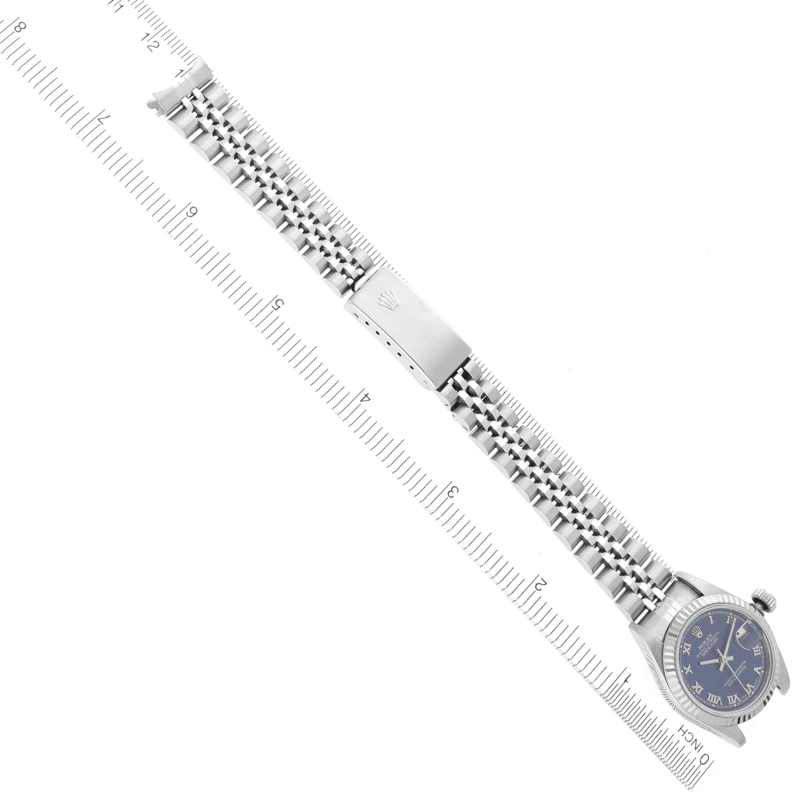 The Rolex Datejust 69174 Women's Stainless Steel Blue Dial 69174 Women's Stainless Steel Blue Dial watch is shown from an overhead angle, displaying its full bracelet and clasp along with the watch face.