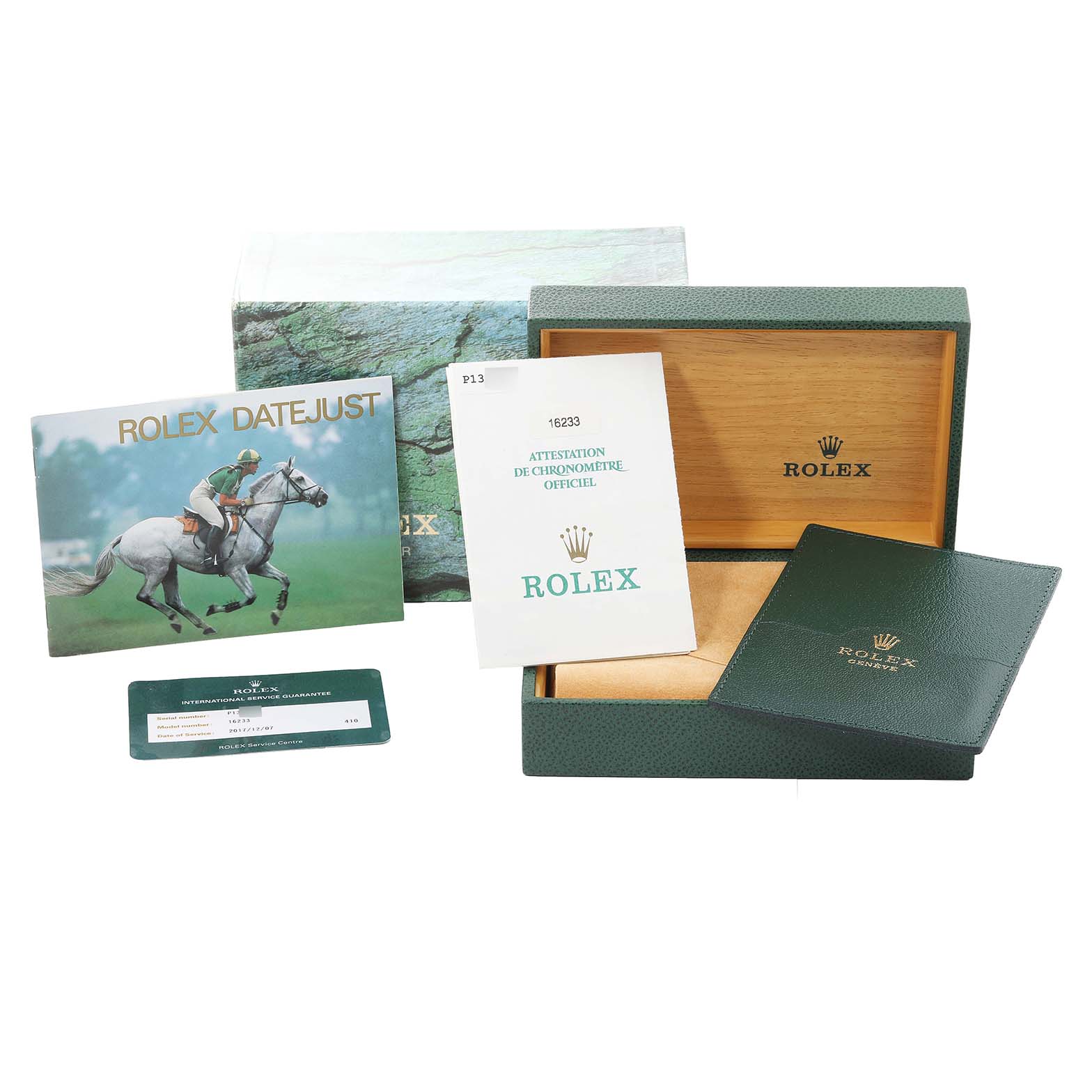 The image shows a Rolex Datejust 16233 Men's Steel and Gold (two tone) Black Dial 16233 Men's Steel and Gold (two tone) Black Dial box, warranty card, booklet, and certificate at an angle from the front.