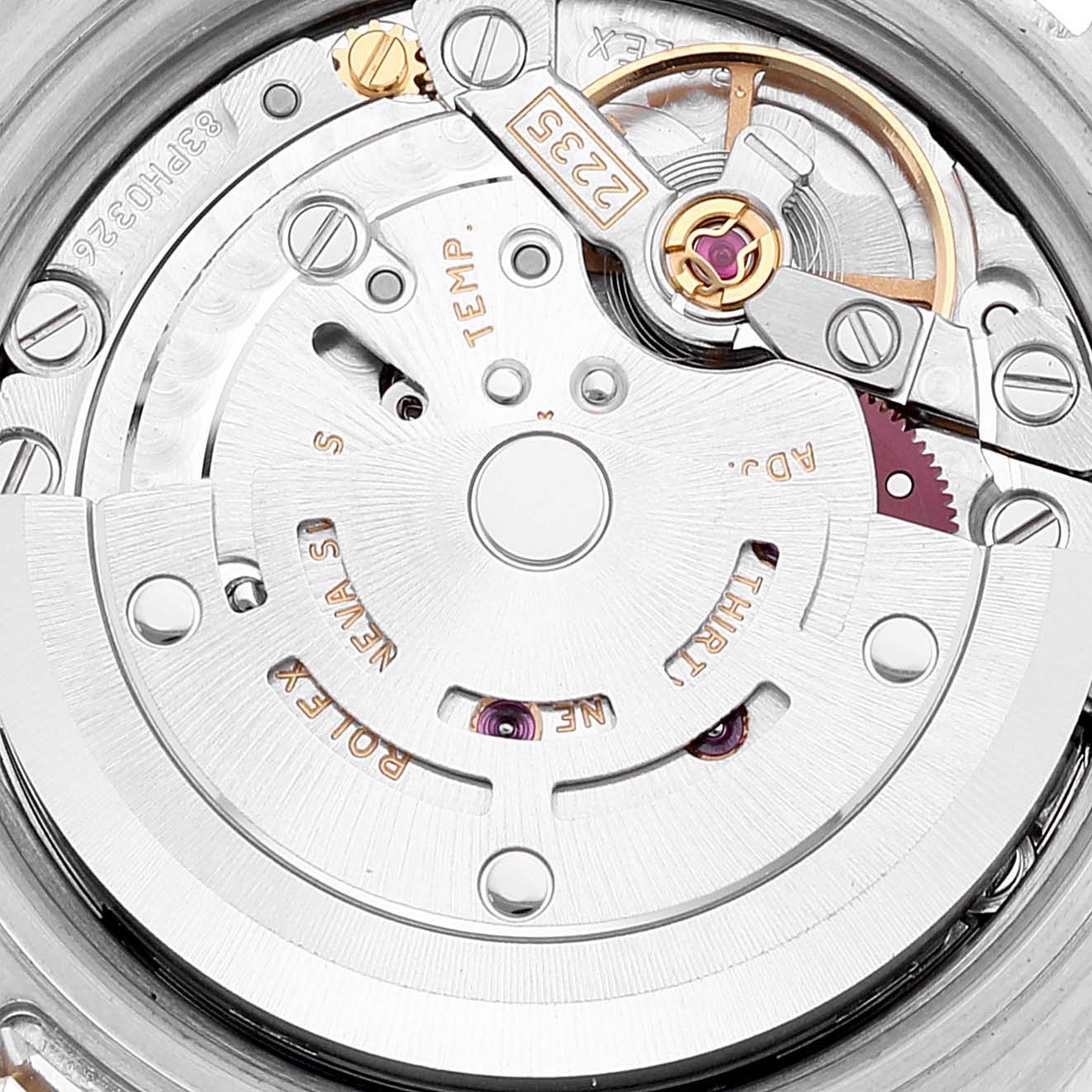 This image shows the intricate inner mechanism and movement of the Rolex Datejust 179173 Women's Steel and Gold (two tone) Silver Dial 179173 Women's Steel and Gold (two tone) Silver Dial watch from a close-up angle.