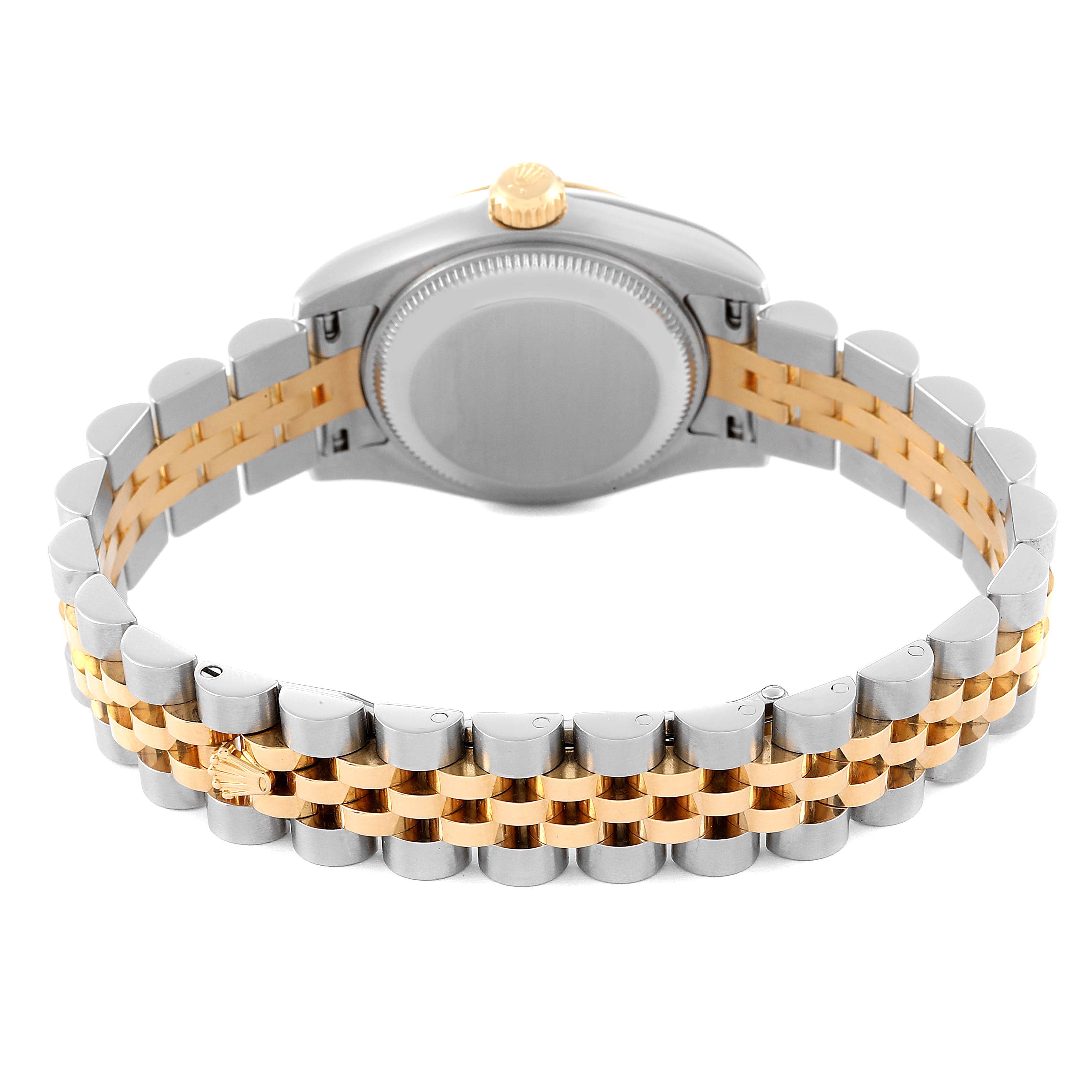 This image shows the back case and bracelet of a Rolex Datejust 179173 Women's Steel and Gold (two tone) Silver Dial 179173 Women's Steel and Gold (two tone) Silver Dial watch, highlighting the two-tone metal links.