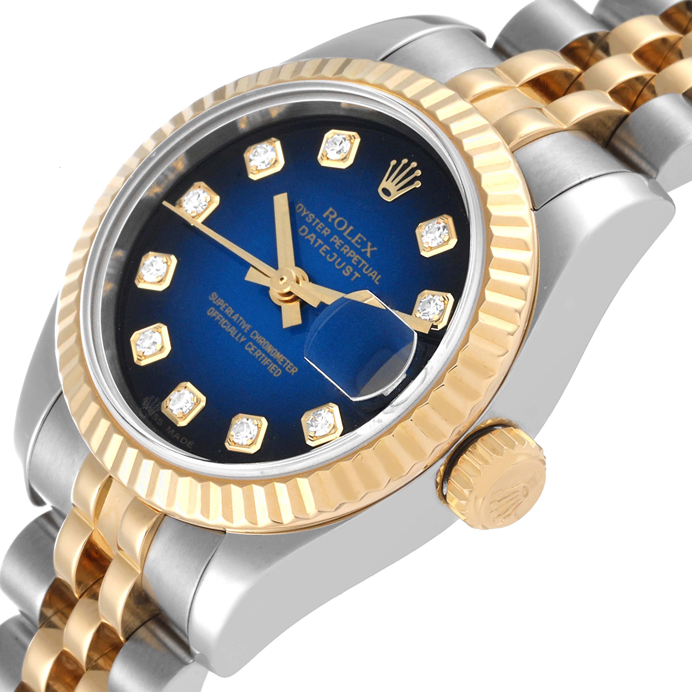 The image shows a close-up, angled view of a Rolex Datejust 179173 Women's Steel and Gold (two tone) Blue Dial 179173 Women's Steel and Gold (two tone) Blue Dial watch featuring its dial, bezel, crown, and bracelet.