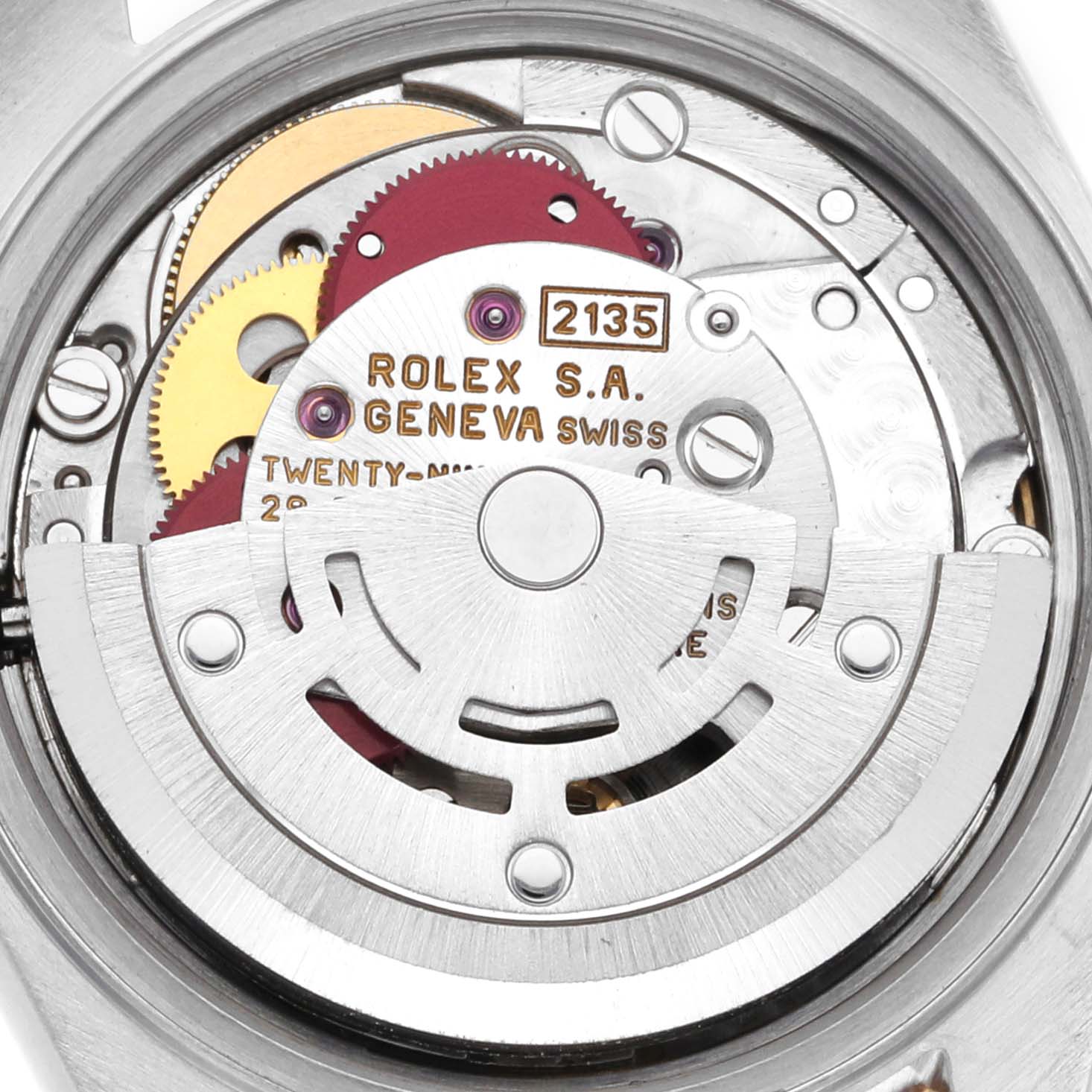 The image shows the internal movement mechanism of a Rolex Datejust 69173 Women's Steel and Gold (two tone) Champagne Dial 69173 Women's Steel and Gold (two tone) Champagne Dial watch, viewed from the back, highlighting gears and engravings.