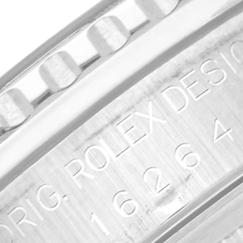 This close-up image shows the engraved bezel and part of the casing of a Rolex Turn-o-Graph 16264 Men
s Stainless Steel Blue Dial 16264 Men
s Stainless Steel Blue Dial watch.
