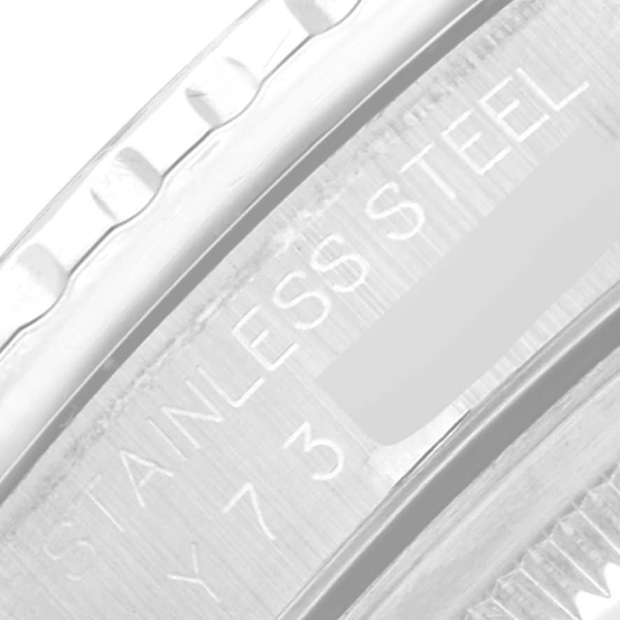 The image shows a close-up angle of the stainless steel case edge with engravings on a Rolex Turn-o-Graph 16264 Men
s Stainless Steel White Dial 16264 Men
s Stainless Steel White Dial watch.
