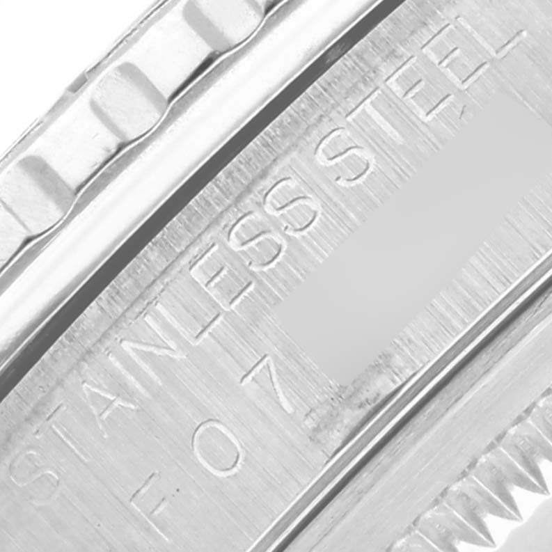 The image shows a close-up of the stainless steel bezel and case edge of a Rolex Turn-o-Graph 16264 Men's Stainless Steel Silver Dial 16264 Men's Stainless Steel Silver Dial watch.