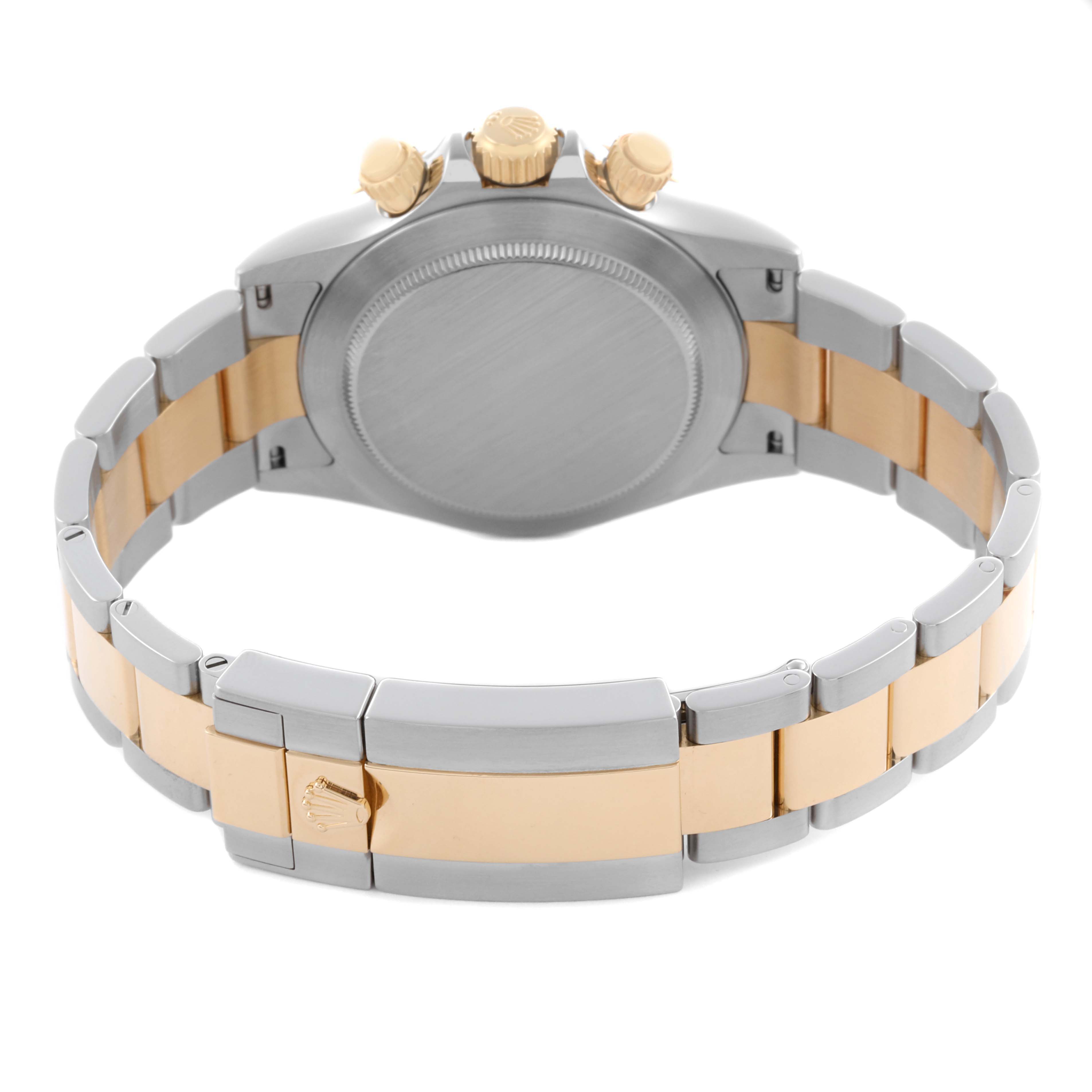 The image shows the back and bracelet of a Rolex Daytona 116523 Men
s Steel and Gold (two tone) Black Dial 116523 Men
s Steel and Gold (two tone) Black Dial, highlighting the two-tone metal and clasp.