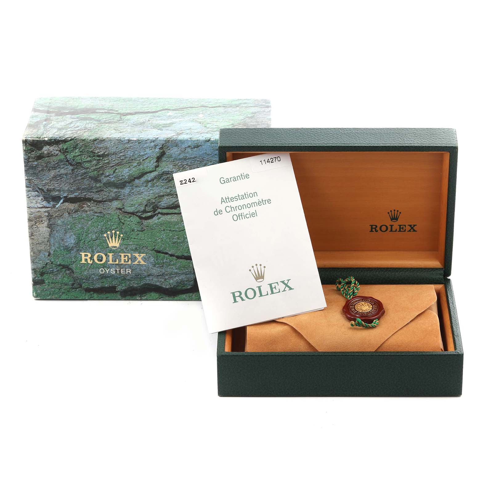 The image shows the packaging and warranty certificate for a Rolex Explorer 114270 Men's Stainless Steel Black Dial 114270 Men's Stainless Steel Black Dial watch, including the outer and inner boxes.