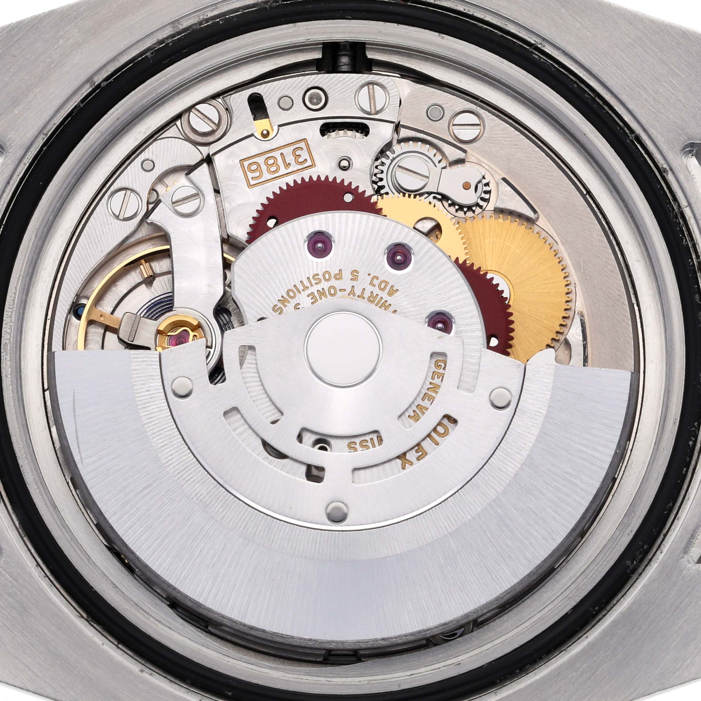 The image shows the internal movement mechanism of a Rolex GMT-Master 116710BLNR Men's Stainless Steel Black Dial 116710BLNR Men's Stainless Steel Black Dial watch.