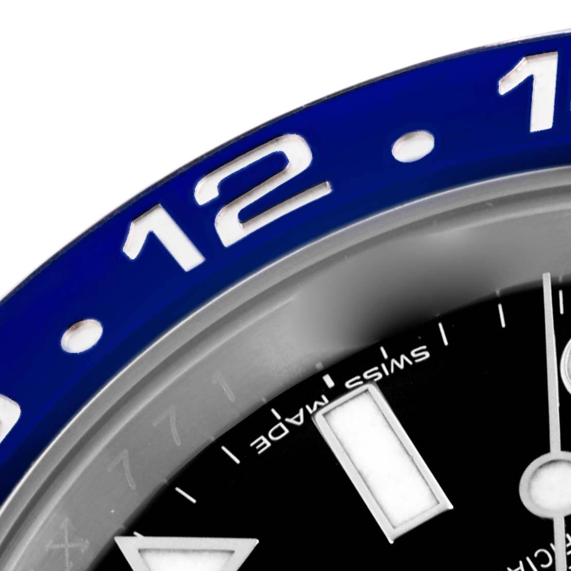 This close-up of a Rolex GMT-Master 116710BLNR Men's Stainless Steel Black Dial 116710BLNR Men's Stainless Steel Black Dial shows the watch face, bezel, and numerals, focused on the 12 o'clock position.