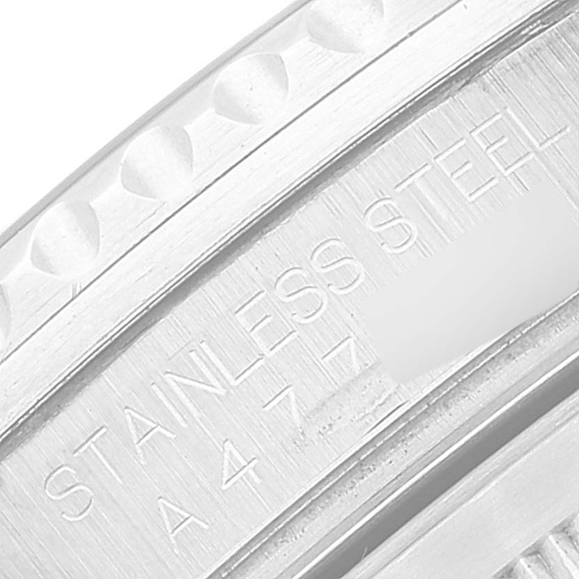 The image shows the side angle of the case back of a Rolex GMT-Master 16710 Men
s Stainless Steel Black Dial 16710 Men
s Stainless Steel Black Dial, highlighting the stainless steel engraving.